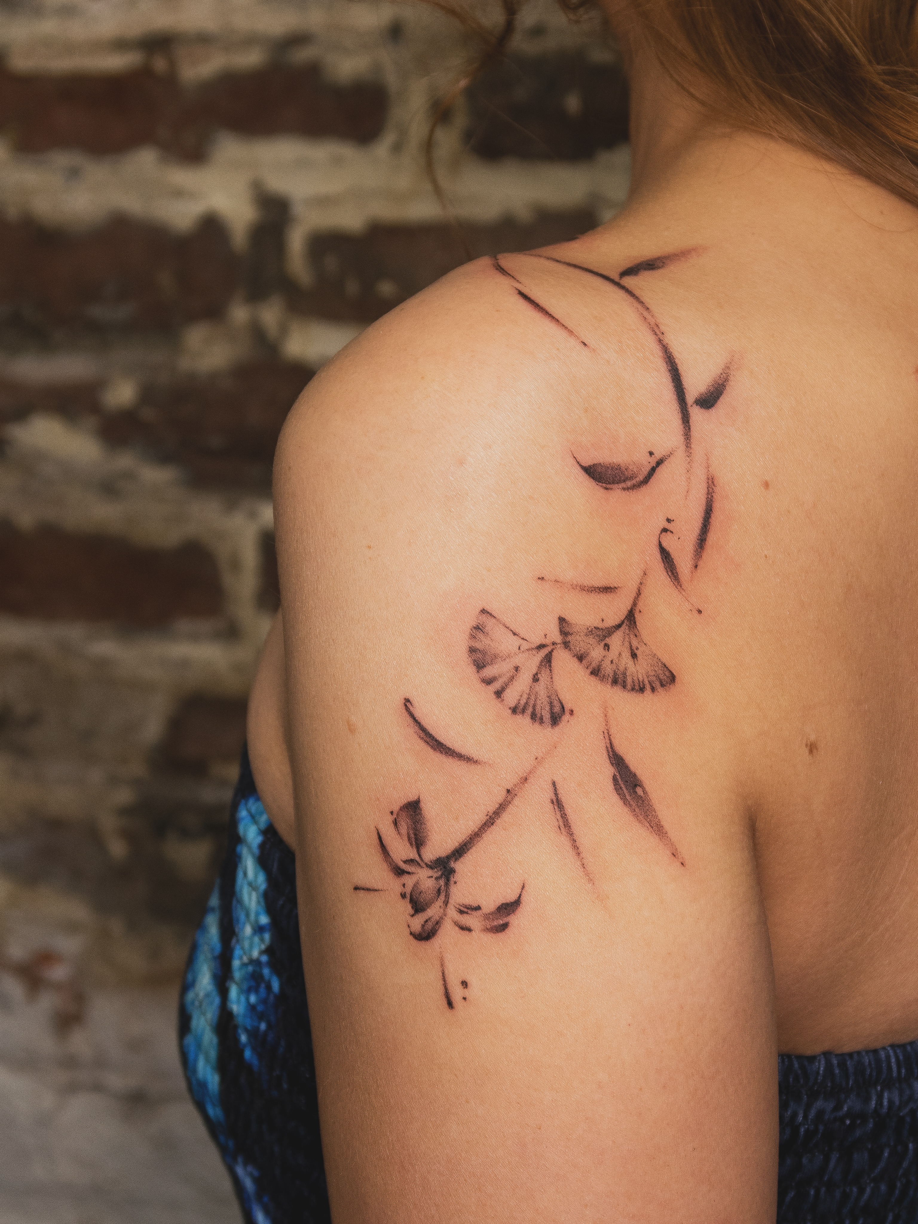 Flower black and grey tattoo on the shoulder by justin
