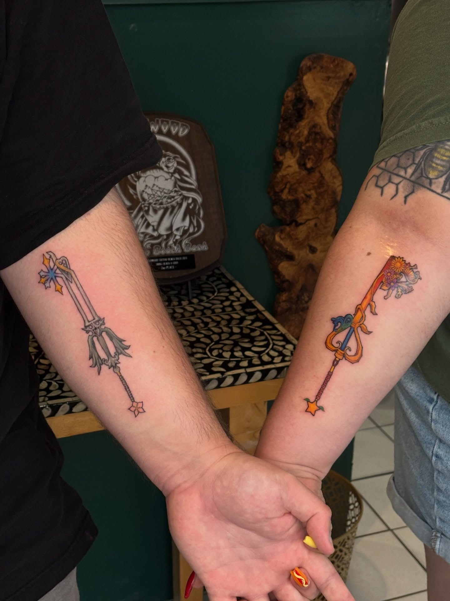 Keyblade new school tattoo on the forearm by Chloe Shay