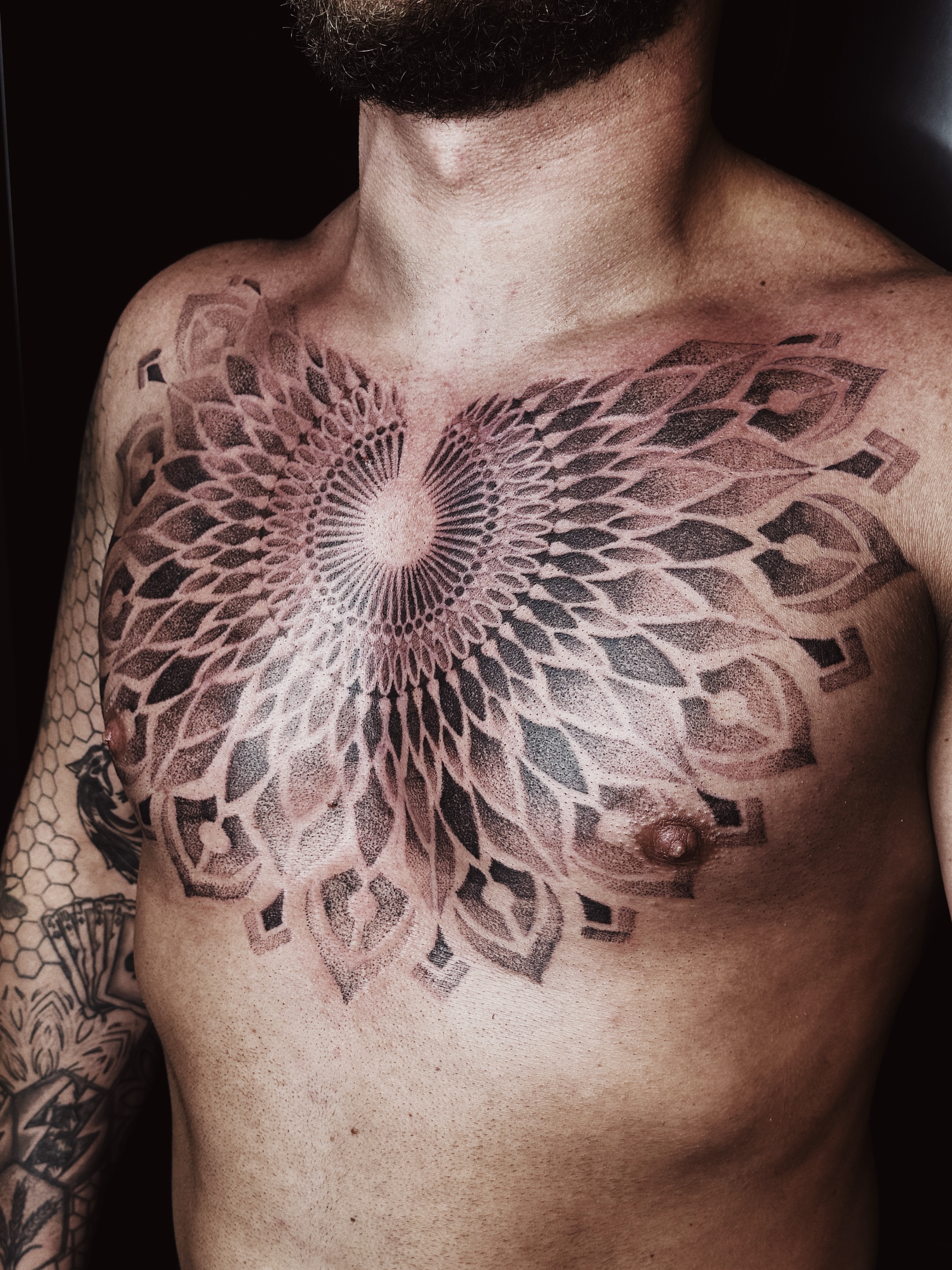 Geometric mandala dotwork tattoo on the chest by πΉπ°π½πππ΄π½ πΆπ»π΄π½π½, North Logan, Utah