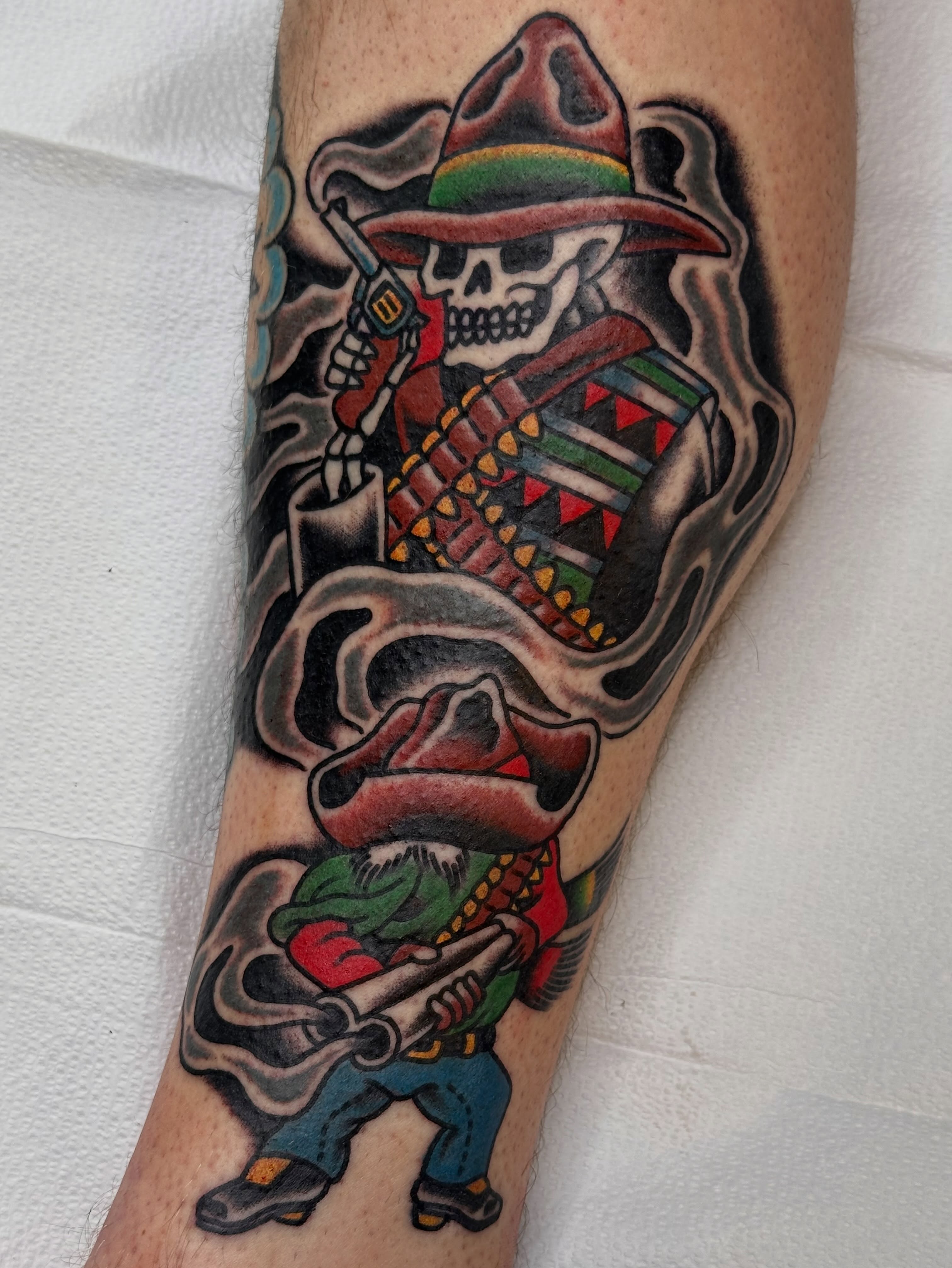 Skull in sombrero American traditional tattoo on the forearm by Cody Woolard, Seymour, Tennessee