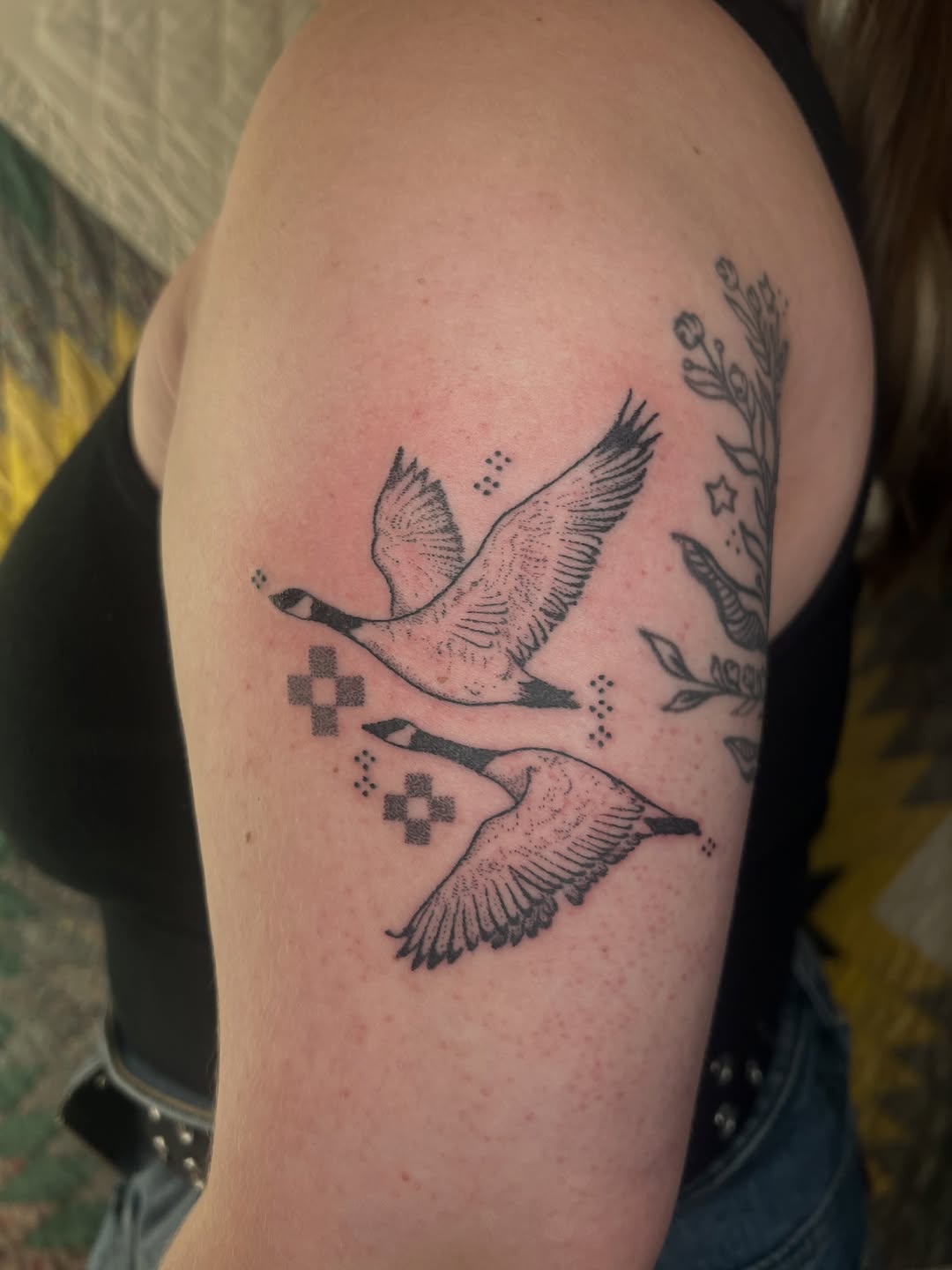 Two geese flying fine line tattoo on the shoulder by faith