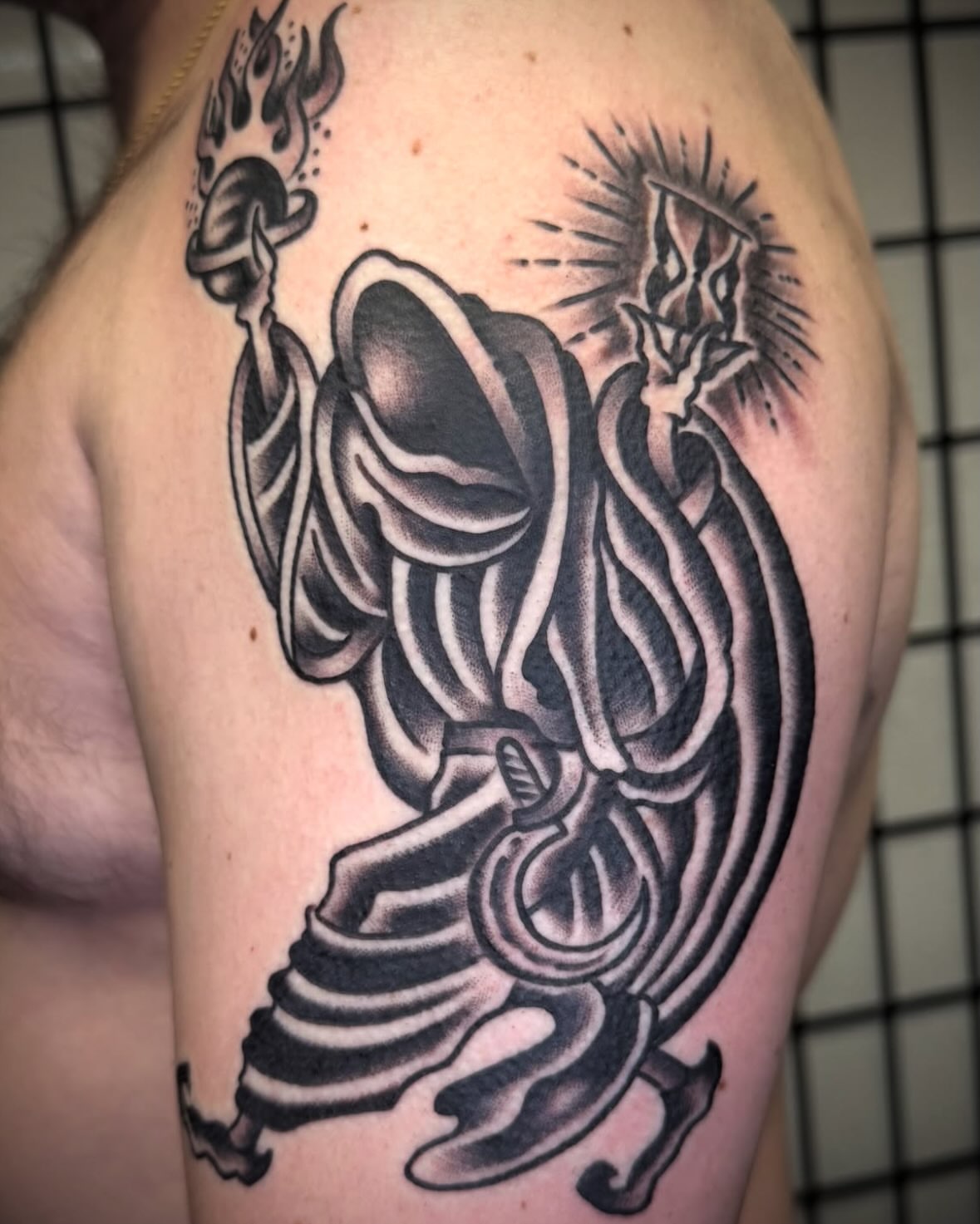 Tattoo by @tats.a.million — black_and_grey