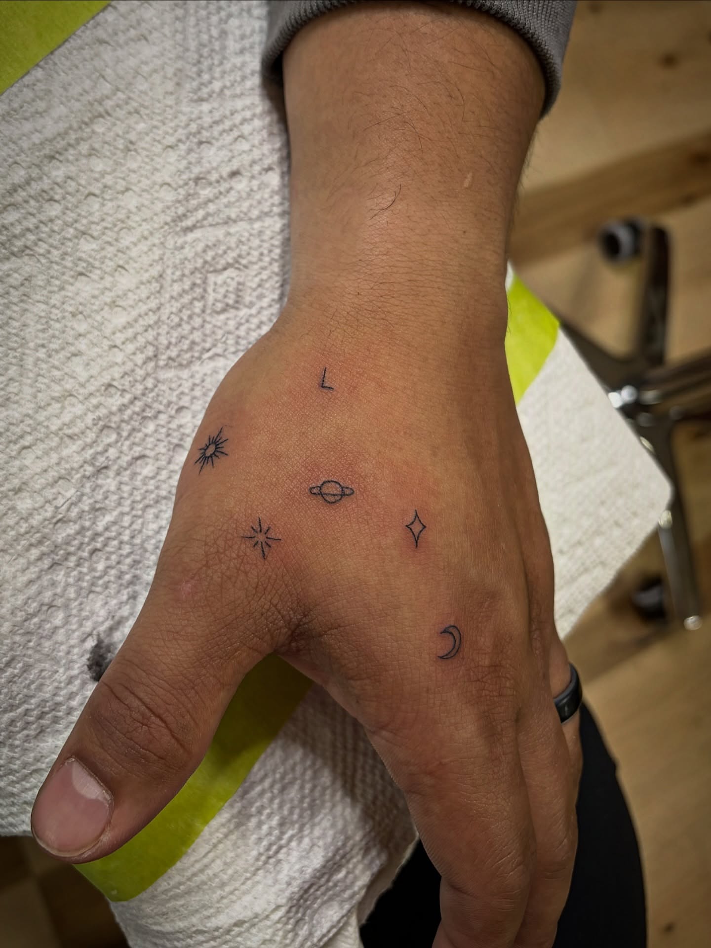 Astronomical symbols geometric tattoo on the hand by Francesca Siwa