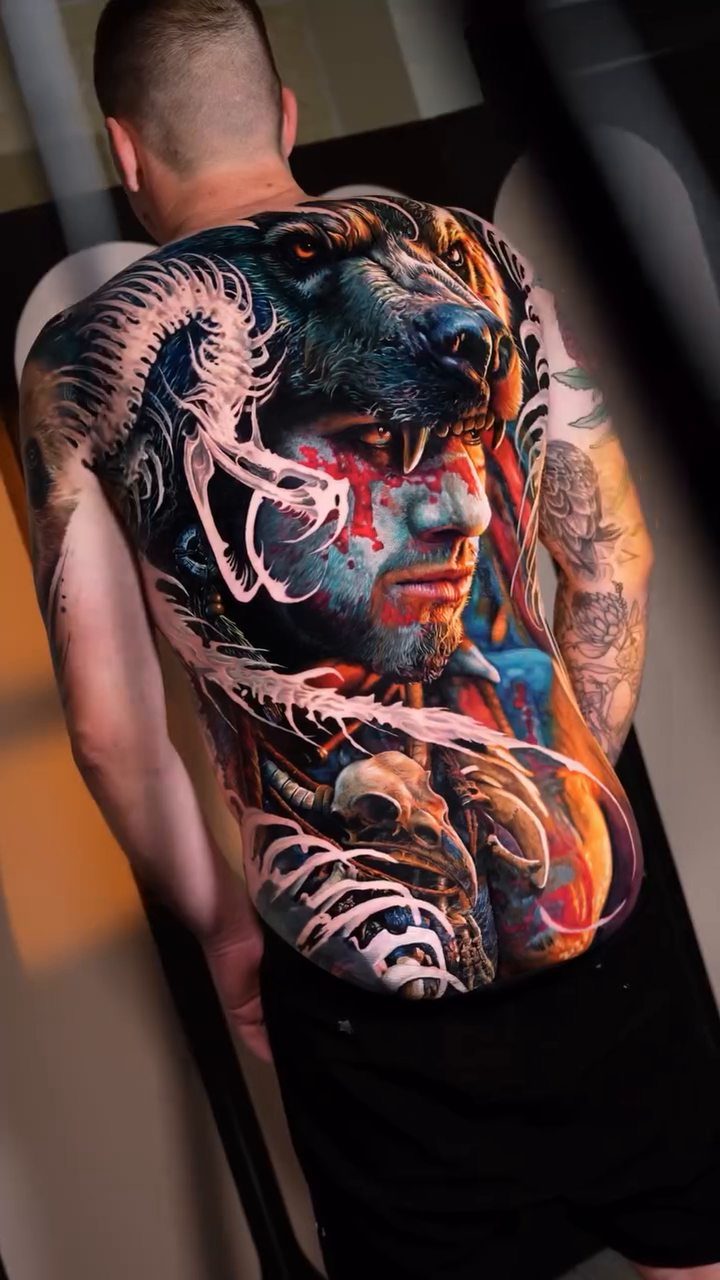 Dragon and face back tattoo surrealism tattoo on the back by Hiroto Nguyen, Perth, Western Australia