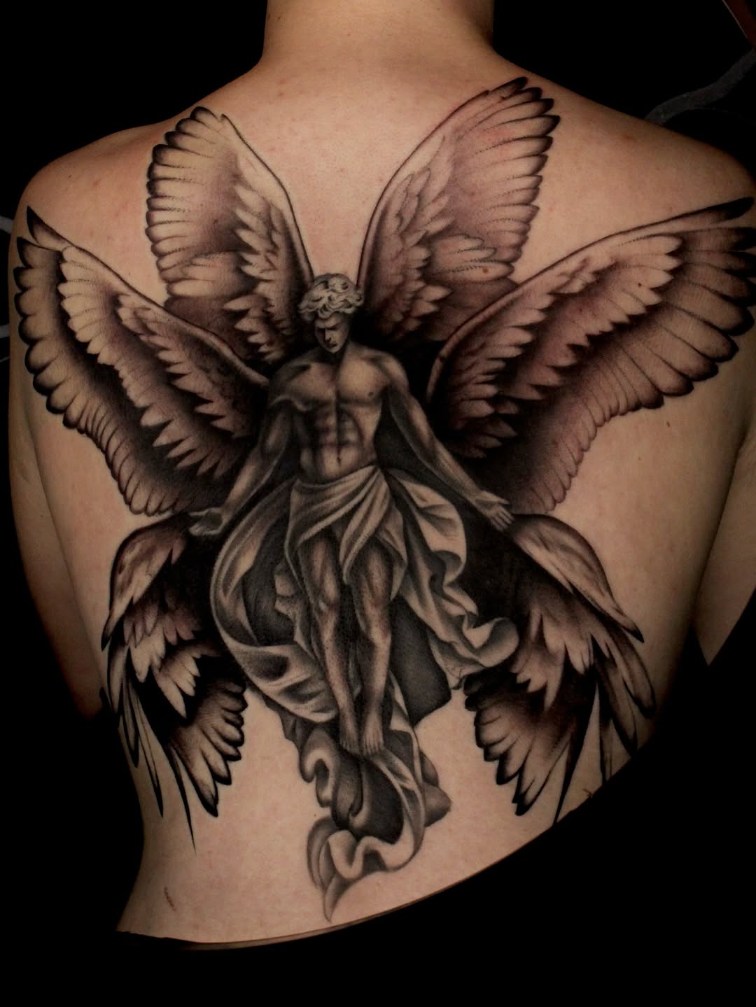 Tattoo by @taboo.tattoos_ — realism, black_and_grey