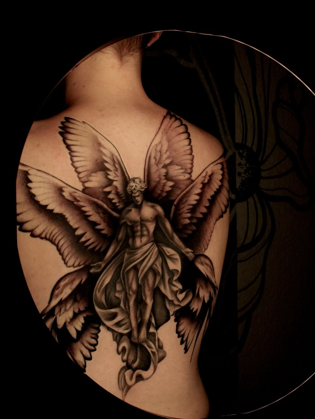 Tattoo by @taboo.tattoos_ — realism, black_and_grey