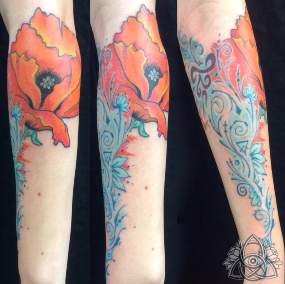 Poppy watercolor tattoo on the forearm by Michael - Tattoo Garden Everett, Everett, Washington
