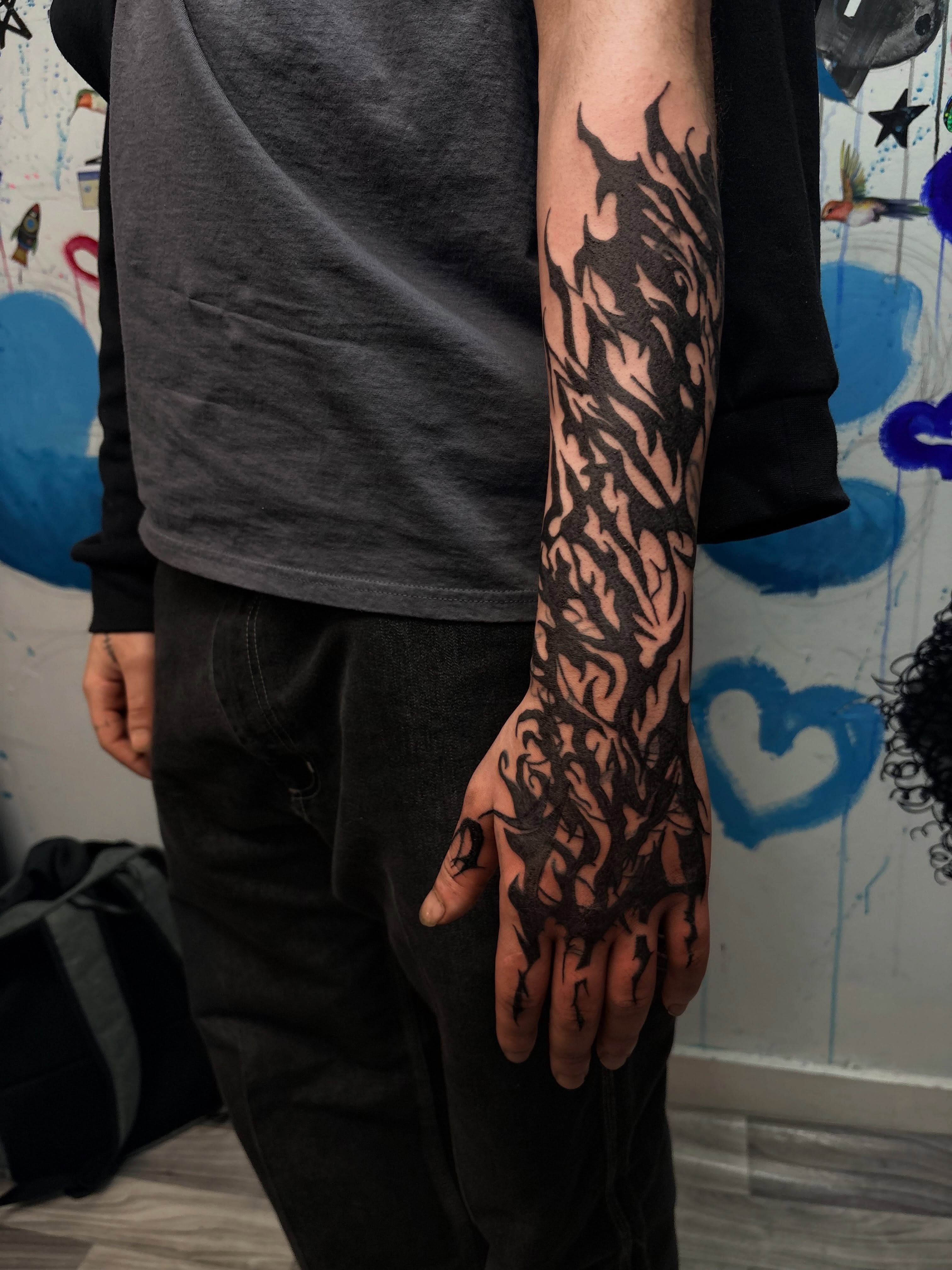 Flames black and grey tattoo on the forearm by 𝓚𝓪𝓻𝓶𝓪💫