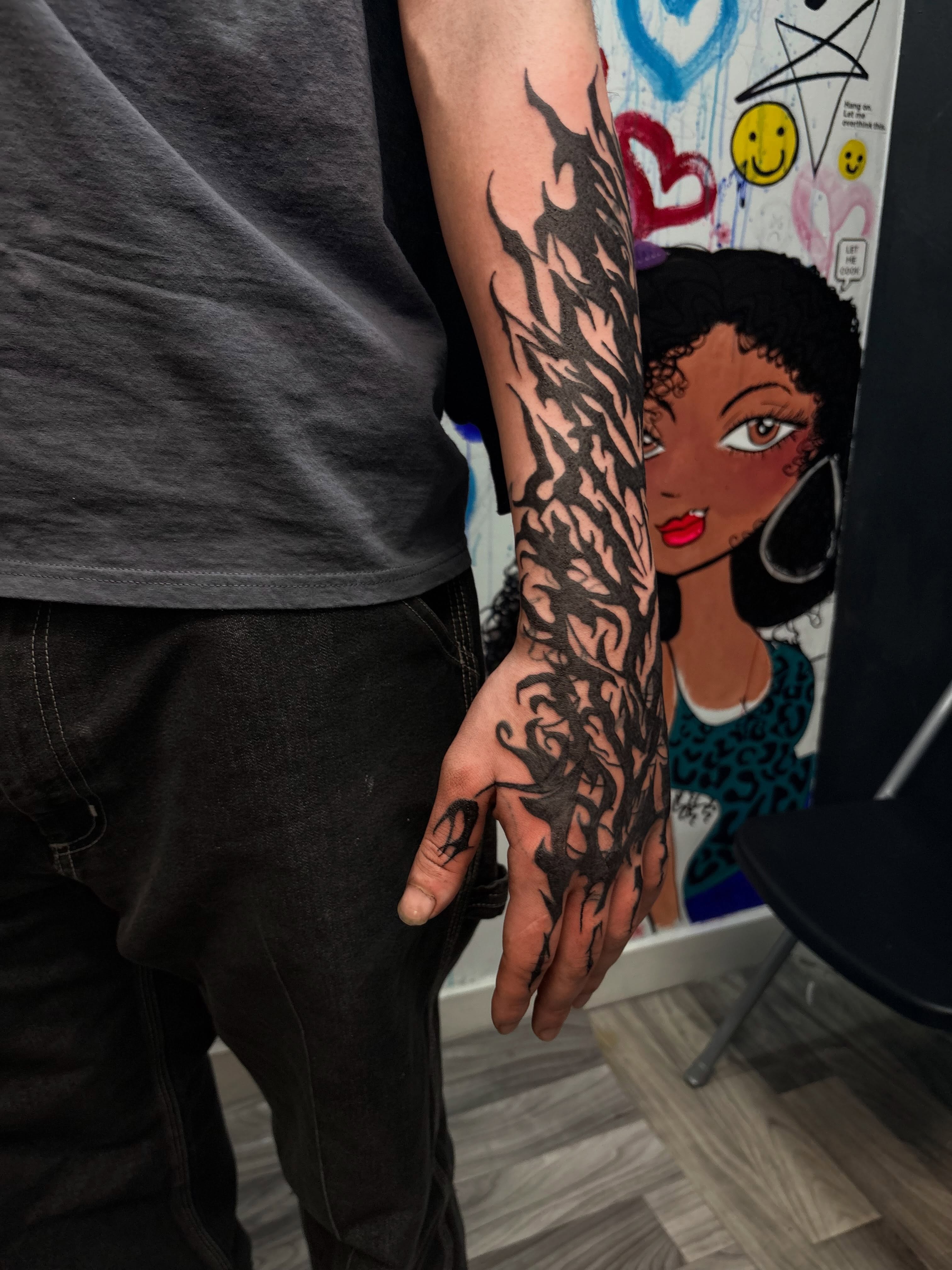 Flame design tribal tattoo on the hand by 𝓚𝓪𝓻𝓶𝓪💫