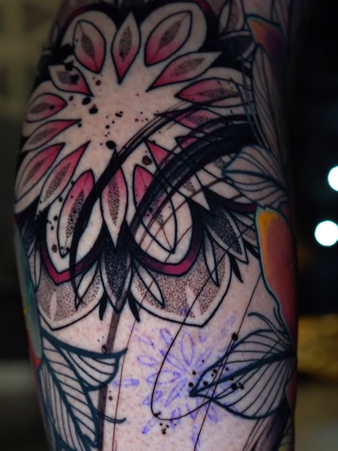 Mandala with floral elements geometric tattoo on the forearm by Haley Corinne