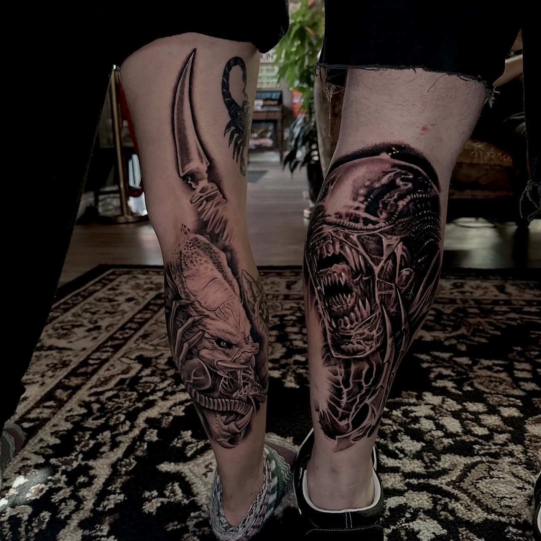 Alien and Predator realism tattoo on the calf by Big Steve Lewis