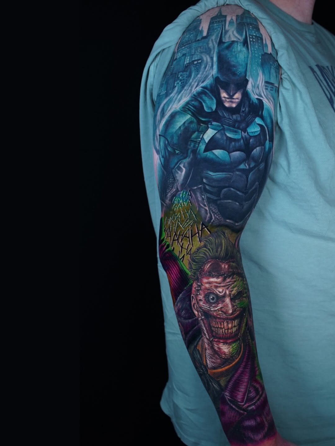Batman and Joker realism tattoo on the forearm by Keebs