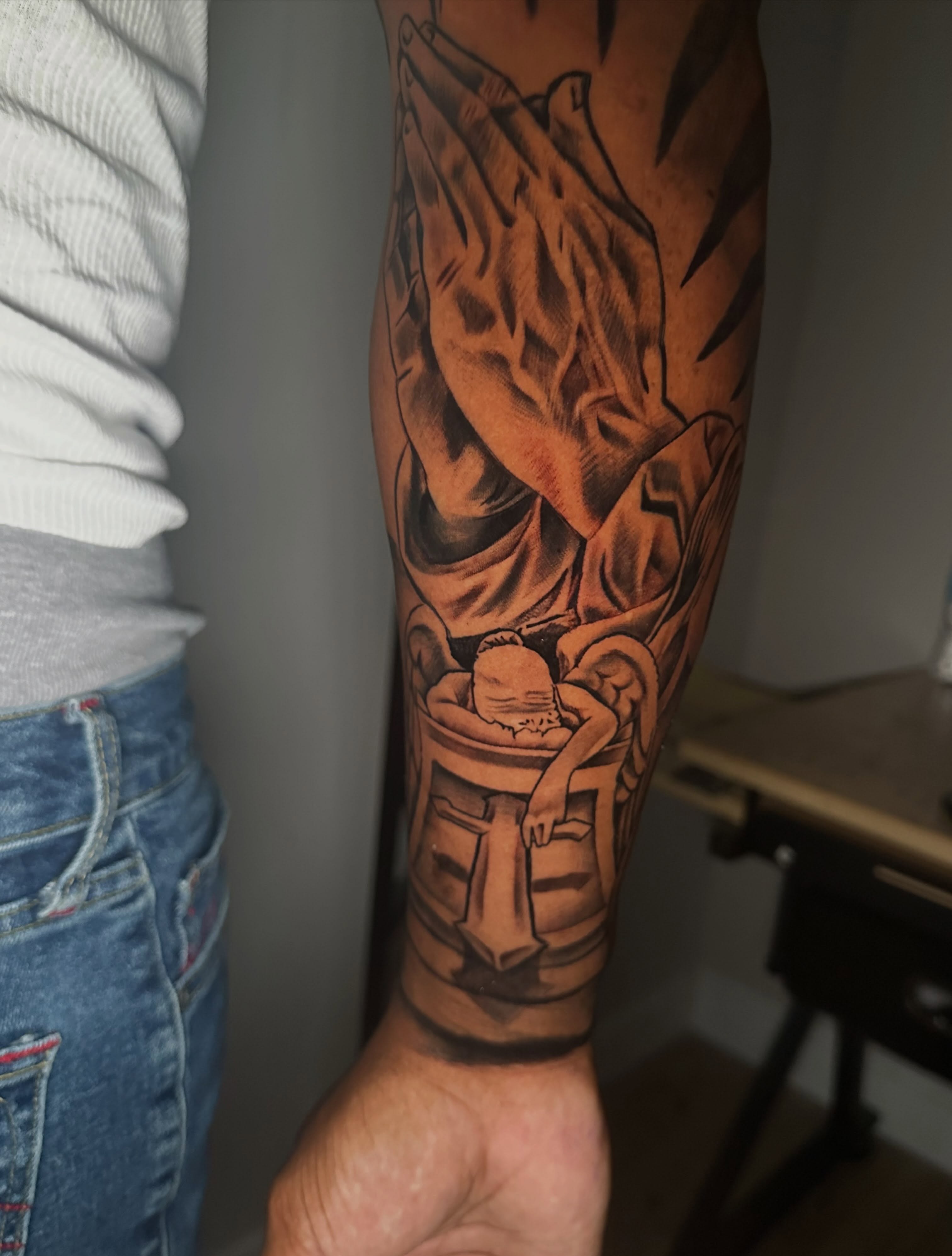 Praying hands realism tattoo on the forearm by I Am Mawlo! Welcome Fellow Mawlonians