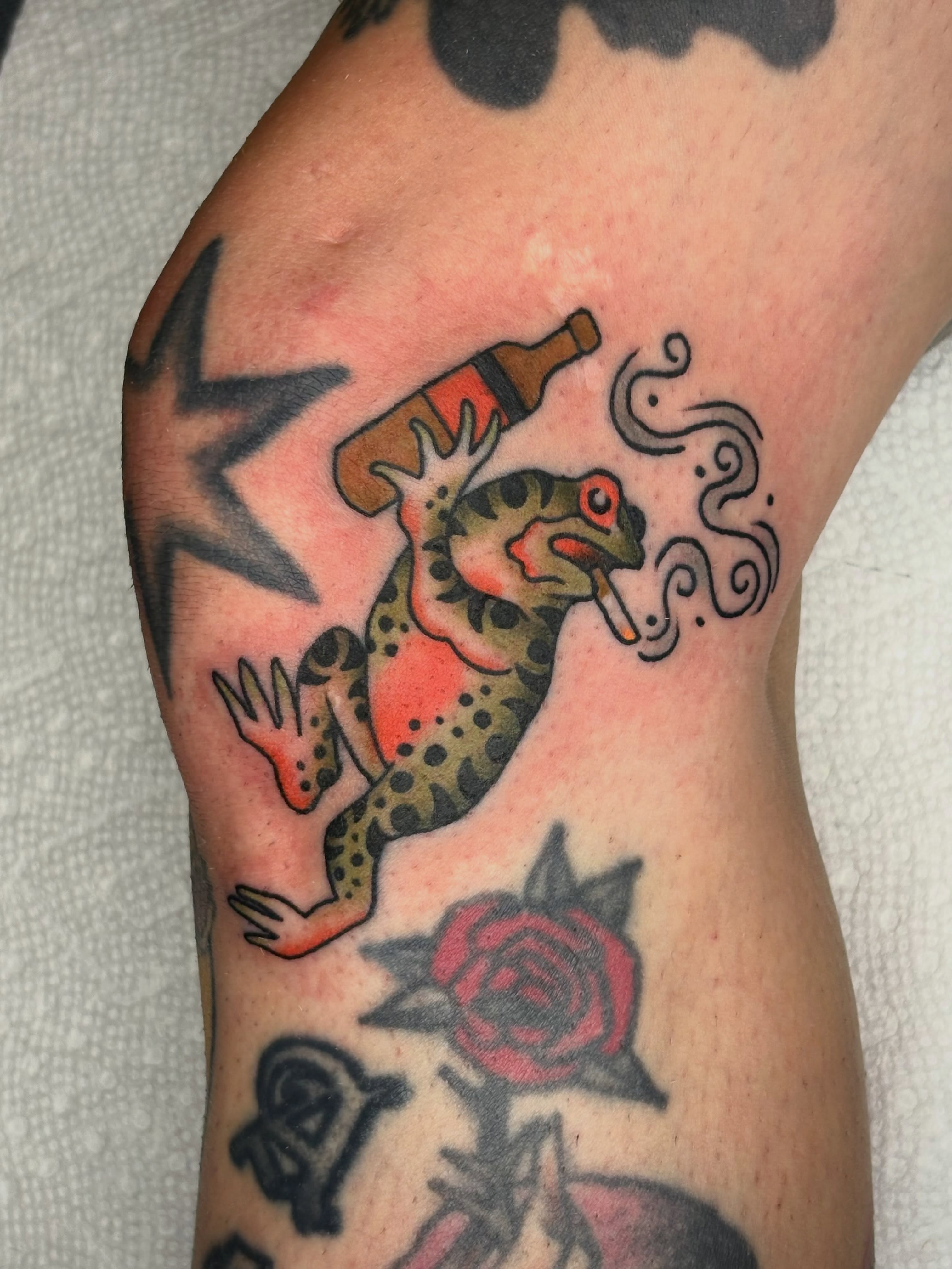 Frog smoking American traditional tattoo on the forearm by Sydney Pflaumer