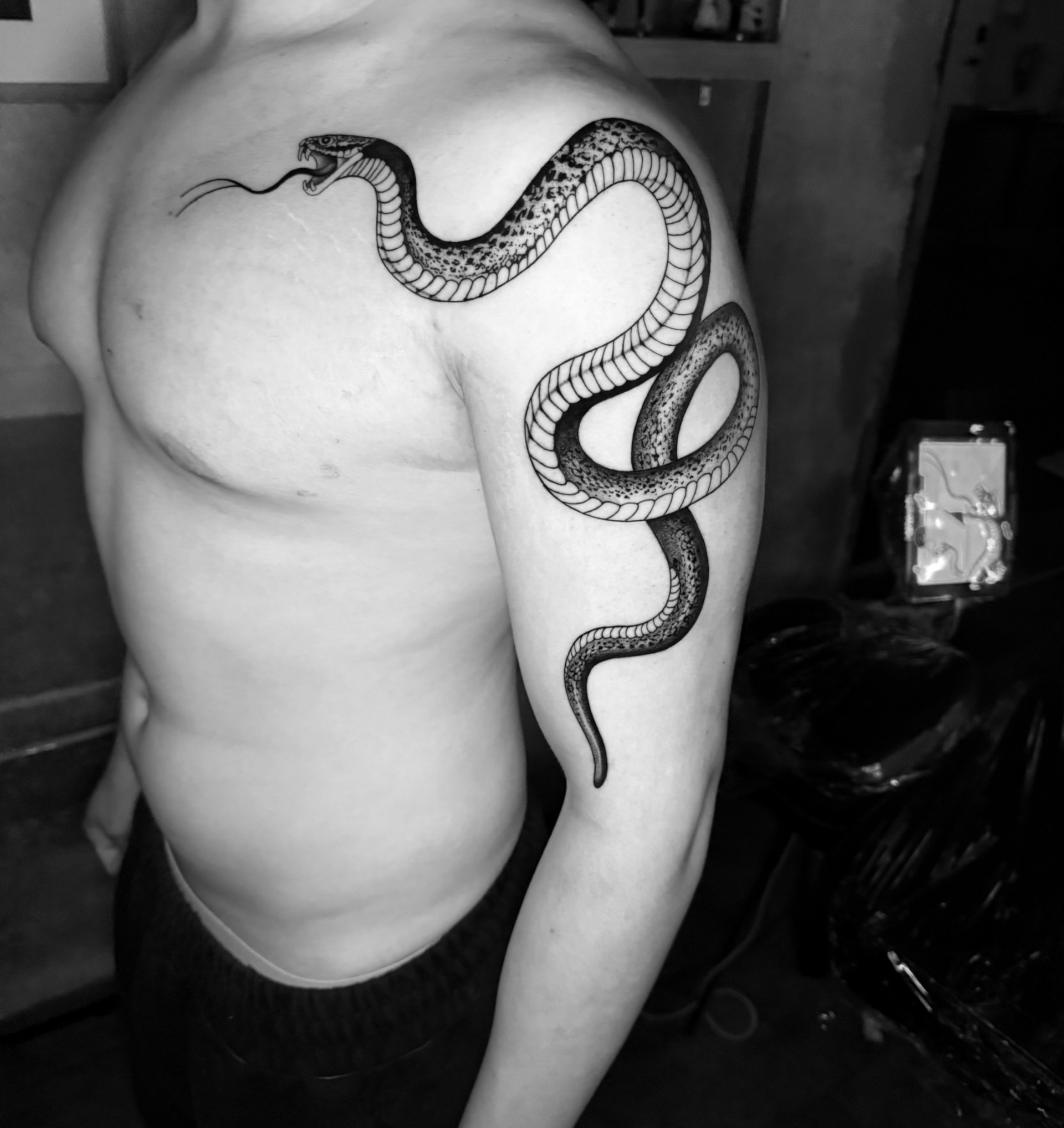 Snake realism tattoo on the shoulder by Tattoo Artist Vanessa