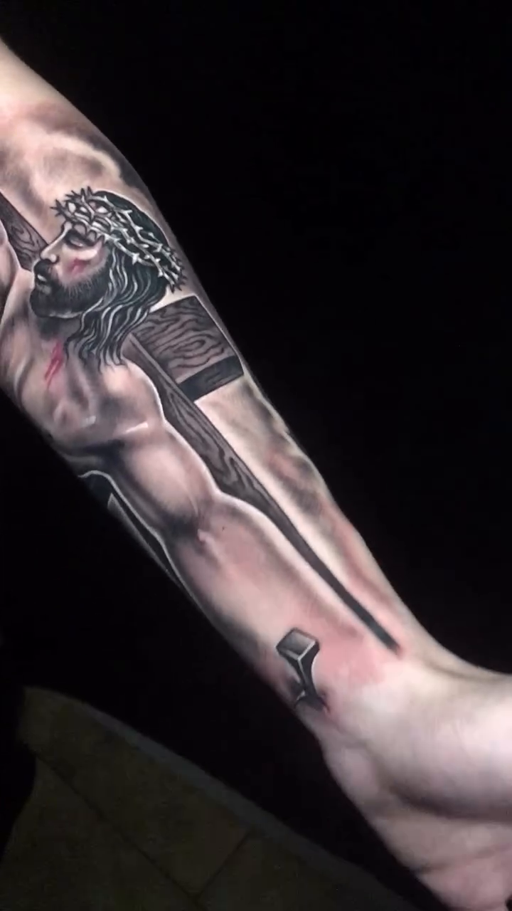 Jesus on the cross realism tattoo by Jose Calderon