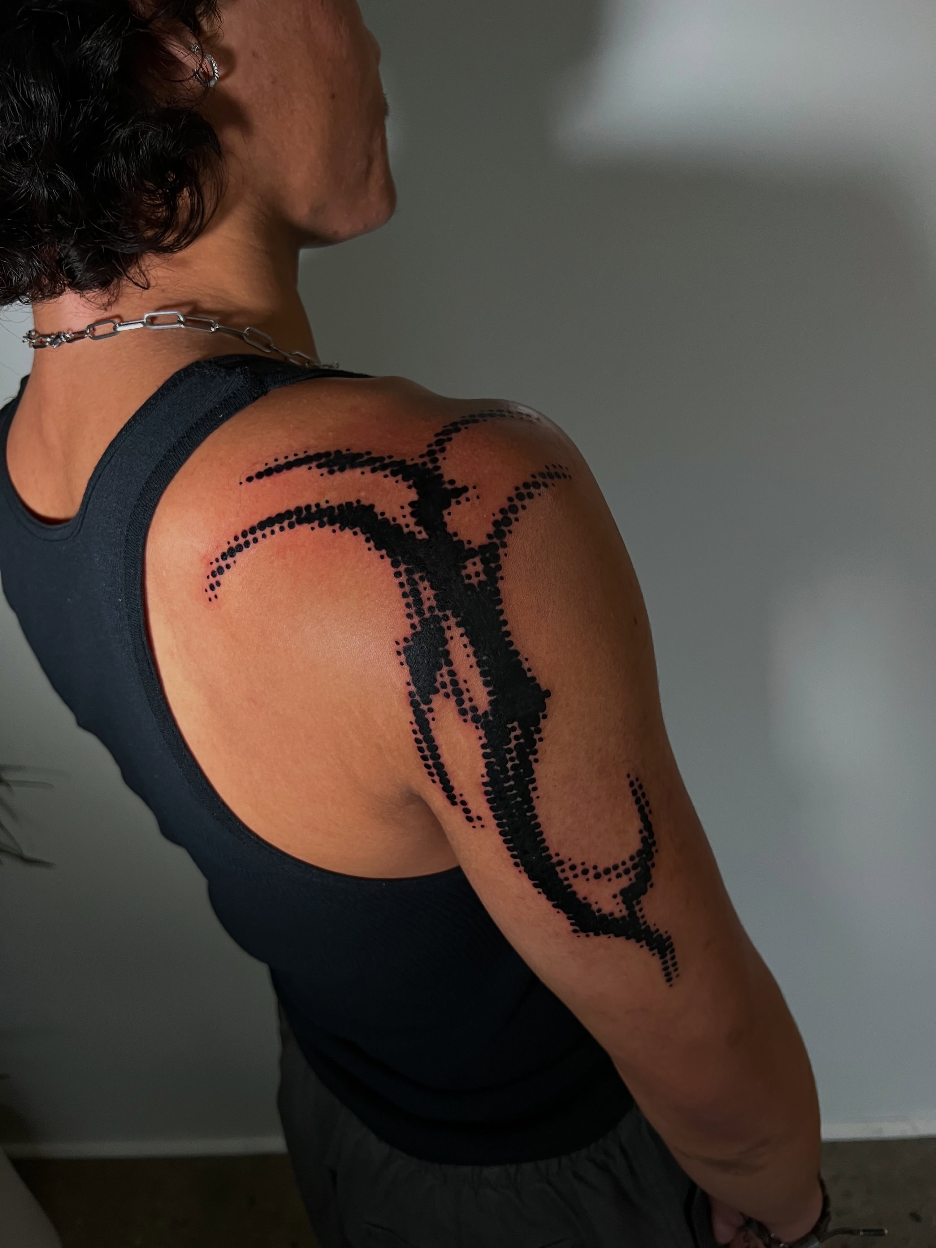 Antlers dotwork tattoo on the shoulder by Riley
