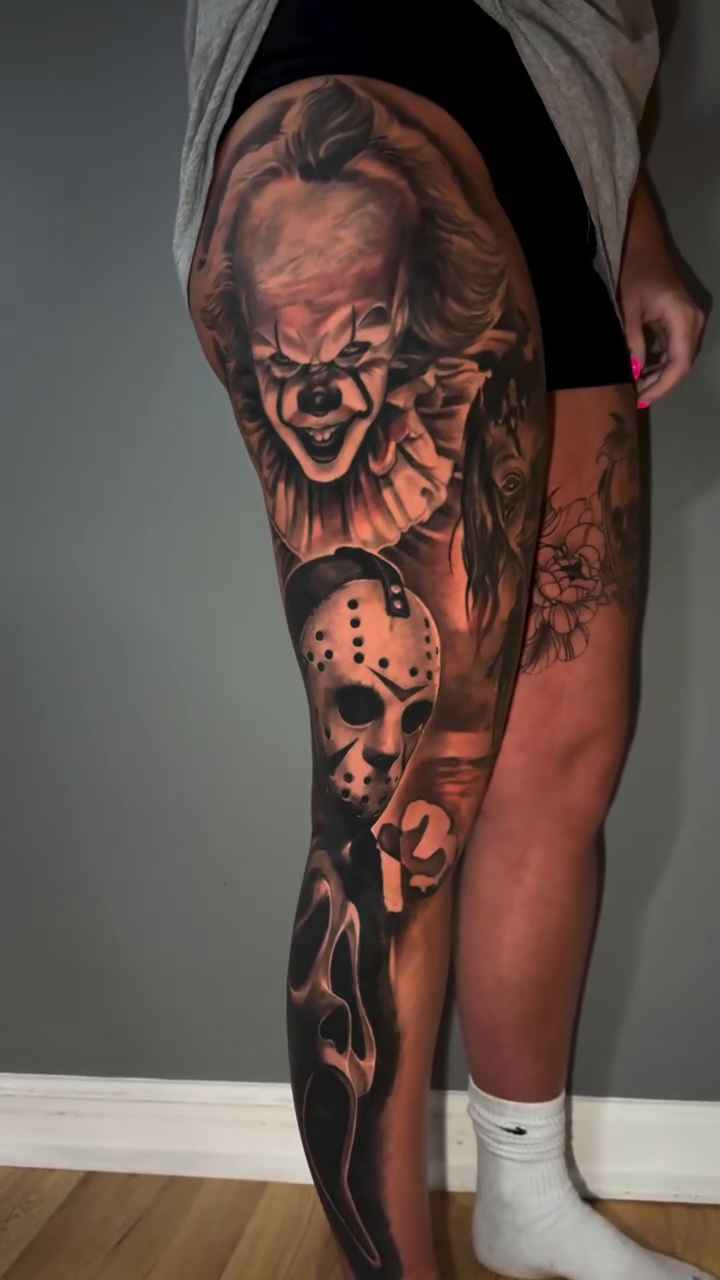 Horror movie characters leg sleeve realism tattoo on the leg by Jake Fujimura