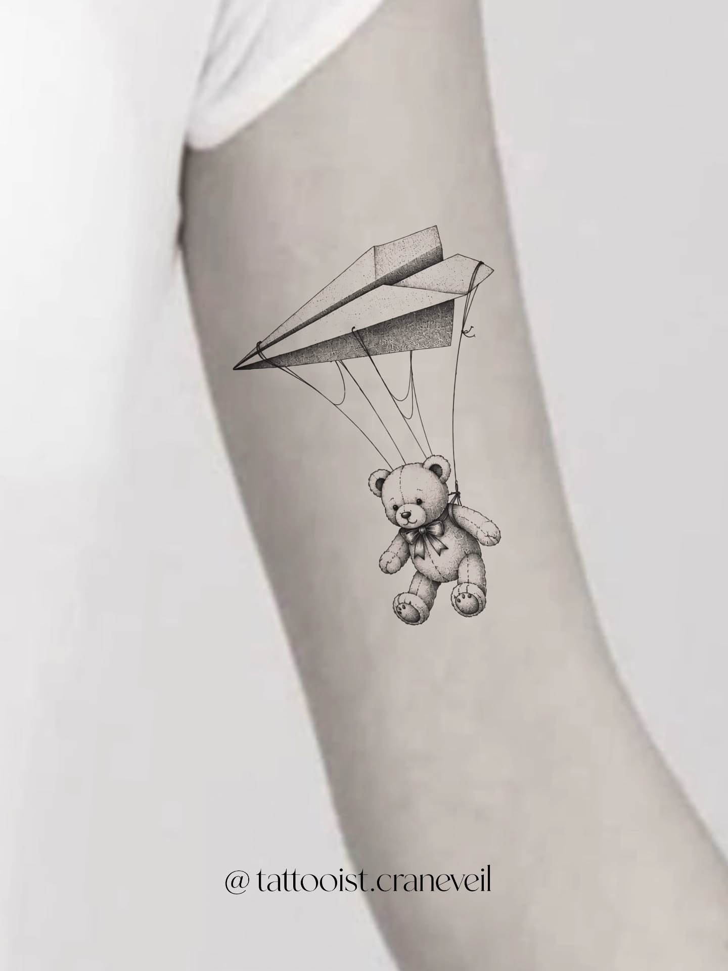 Tattoo by @tattooist.craneveil — black_and_grey, realism