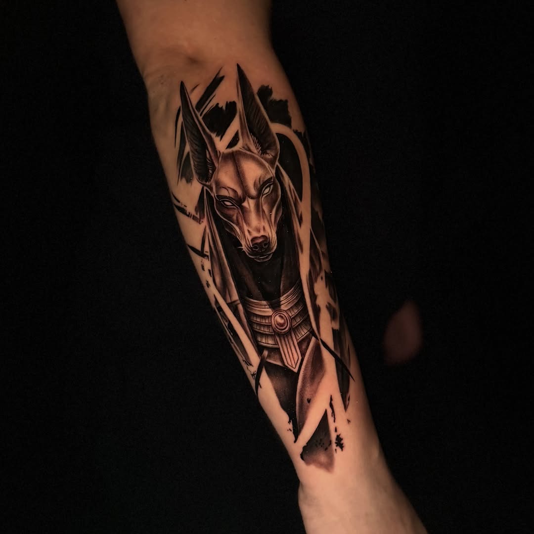 Anubis portrait realism tattoo on the forearm by Tay 🥀