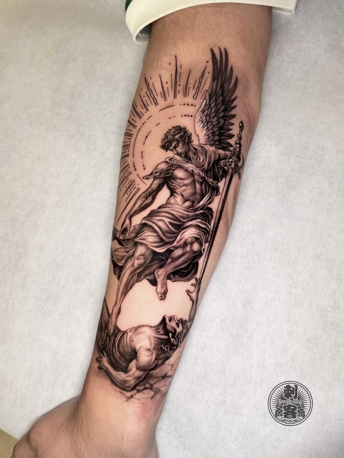Angel and lion realism tattoo on the forearm by Duo