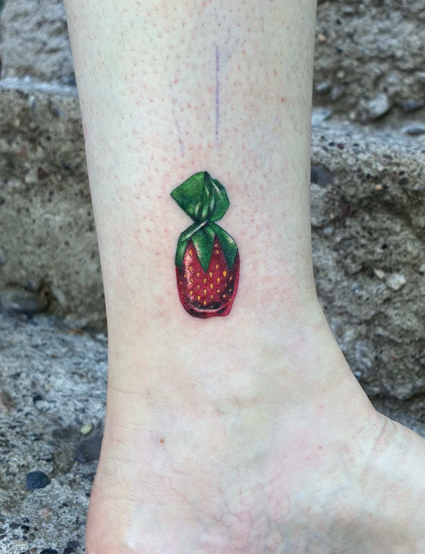 Strawberry realism tattoo on the foot by Linzi Hungerford, Bozeman, Montana