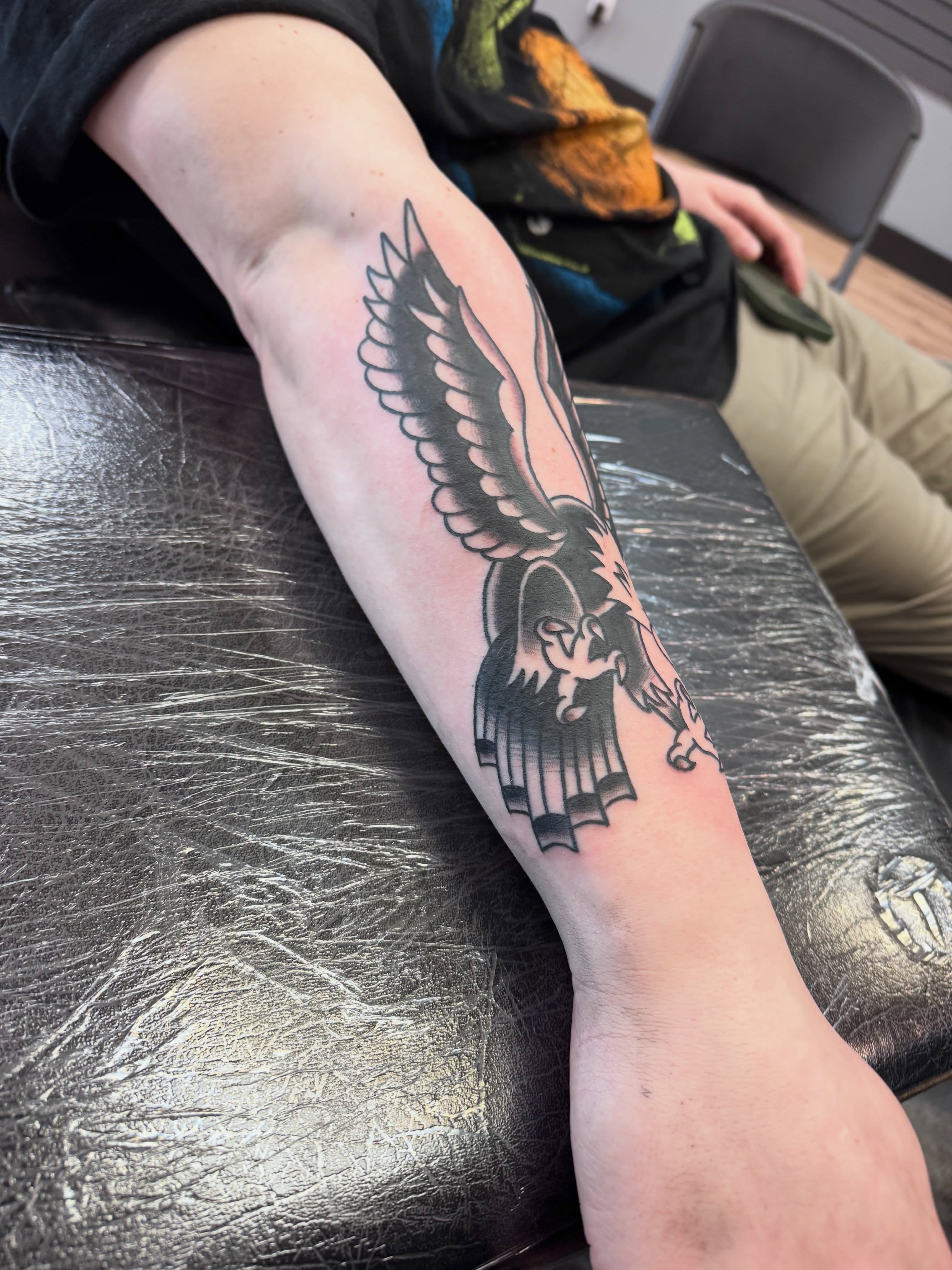 Winged horse black and grey tattoo on the forearm by Justin Chapman, Des Moines, Iowa