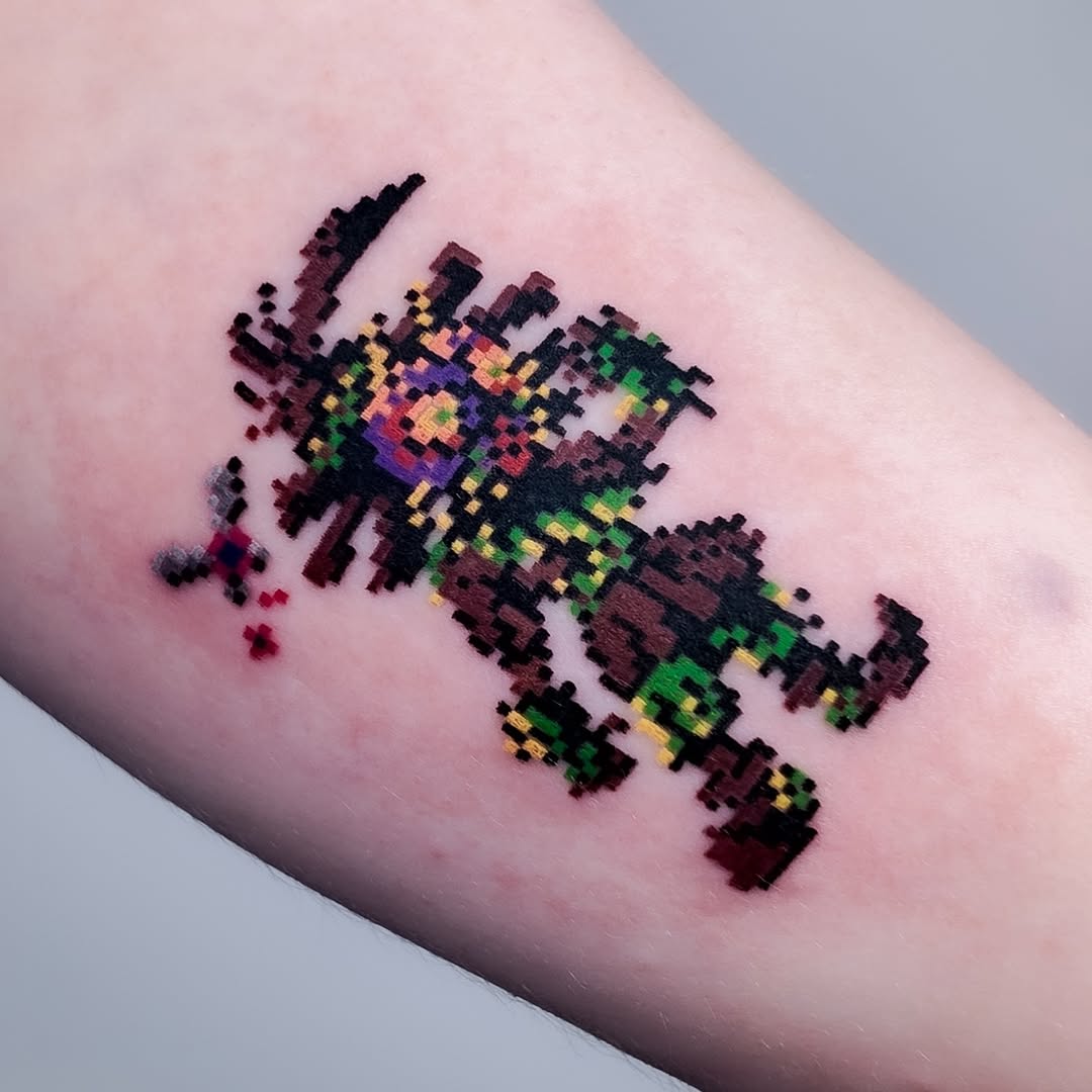 Tattoo by @mrpixel.tattooer — pixel_art
