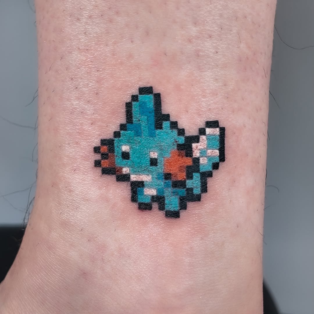 Tattoo by @mrpixel.tattooer — anime, pixel_art