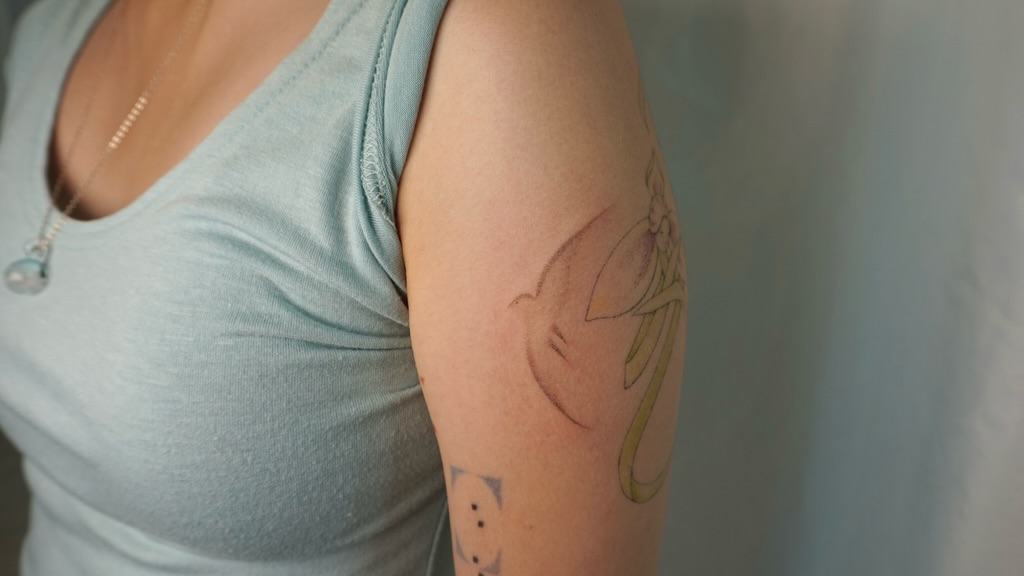 Bird and flower watercolor tattoo on the forearm by 매실 * handpoke
