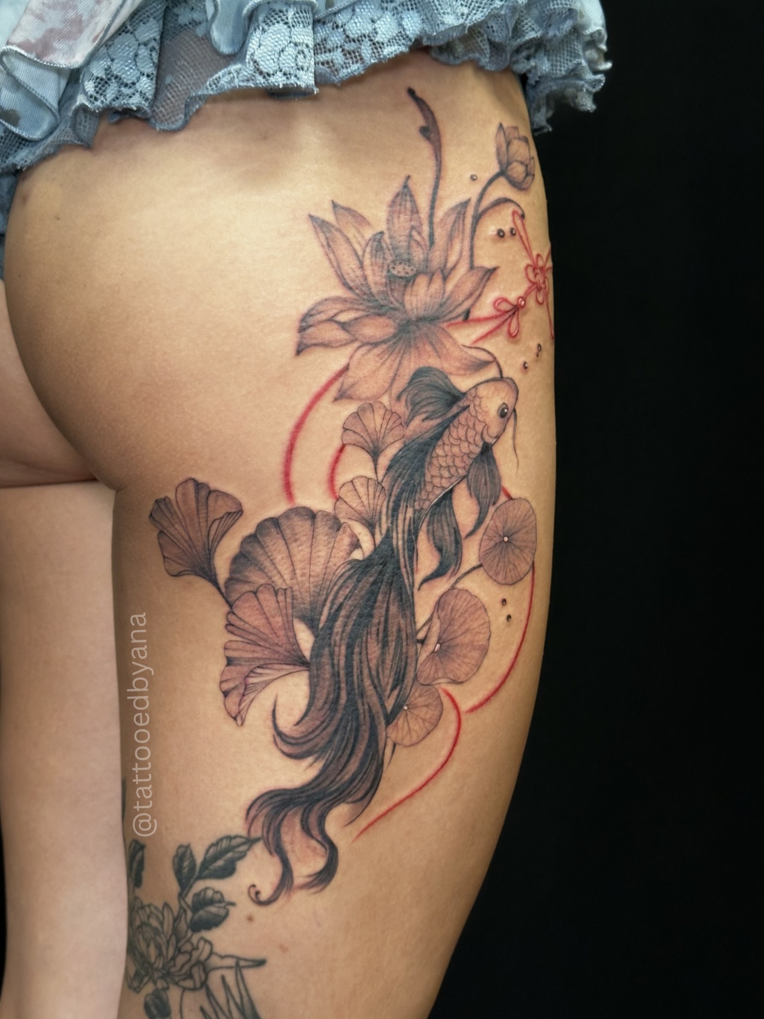 Koi fish and lotus japanese irezumi tattoo on the thigh by Tattoo artist Denver