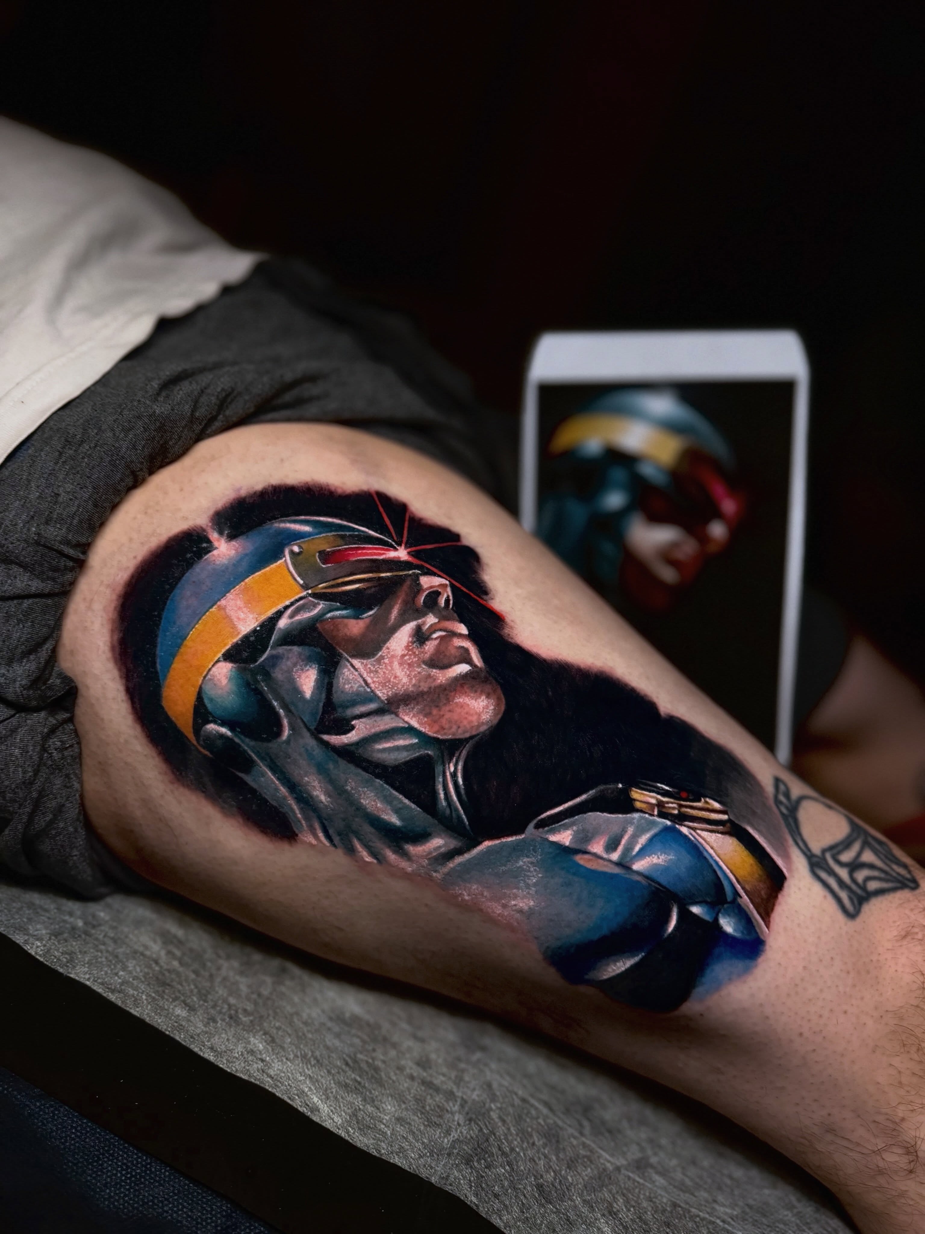 Cyborg realism tattoo on the thigh by Edward best