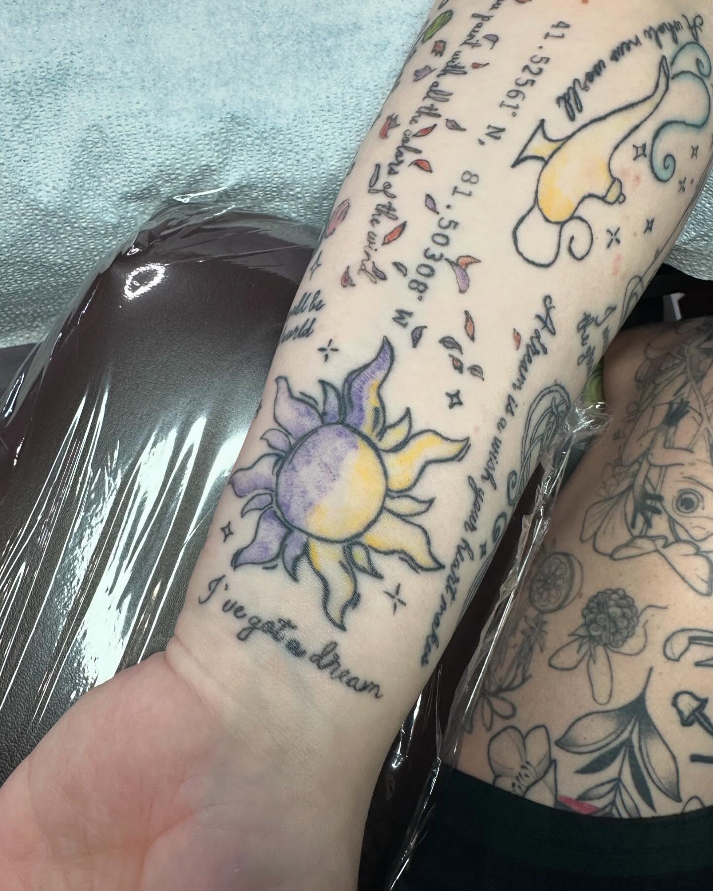 Sun and quote American traditional tattoo on the forearm by Cassandra Rasper-Beard