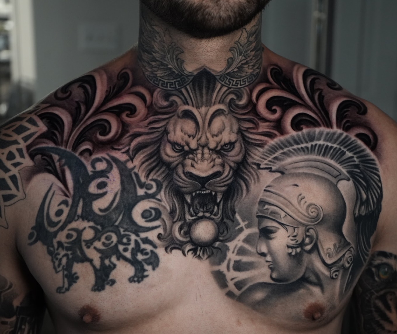 Tattoo by @tattsbyethan_ — realism, black_and_grey
