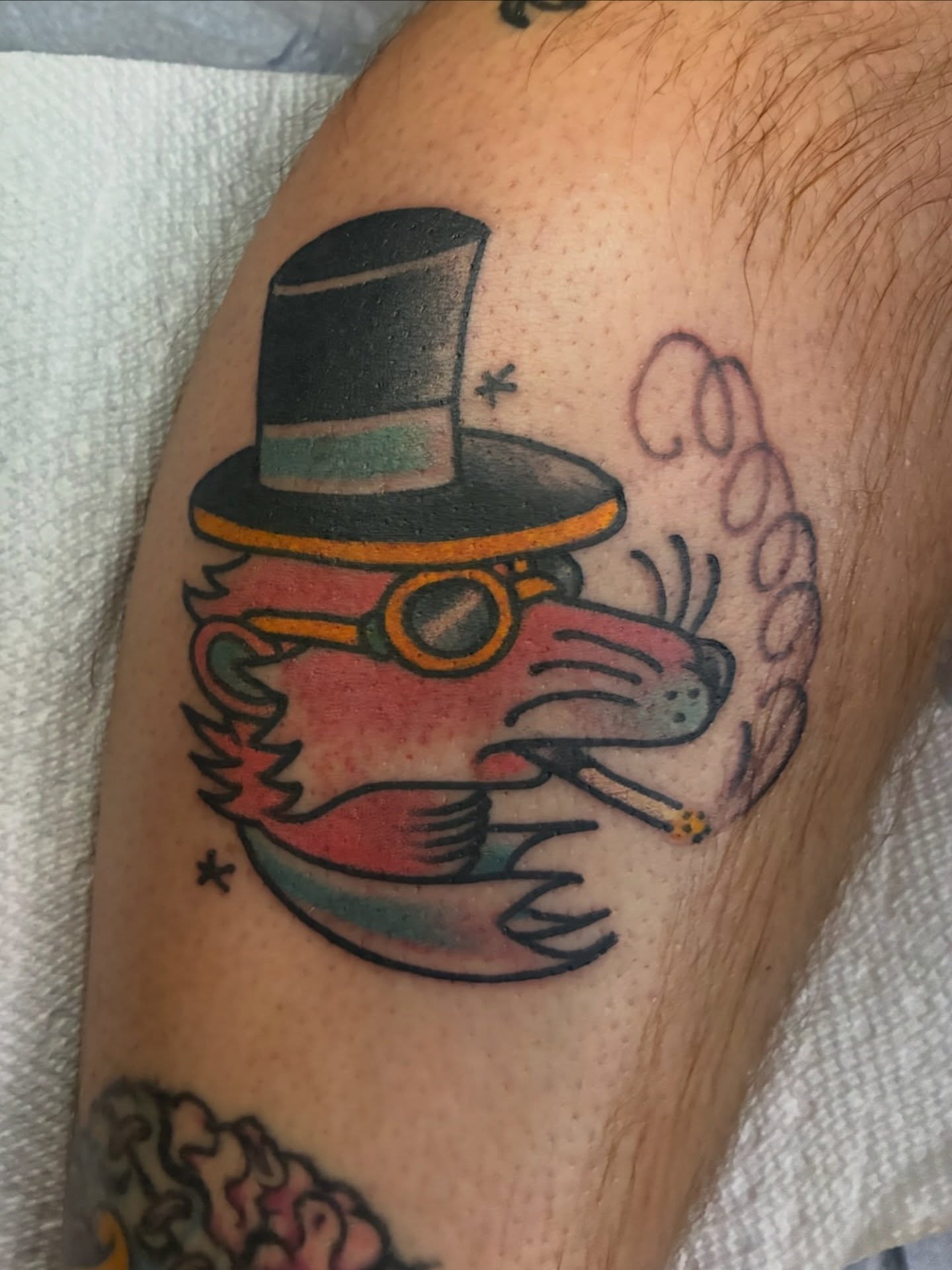 Fox wearing top hat and goggles American traditional tattoo on the forearm by Joey Knuckles