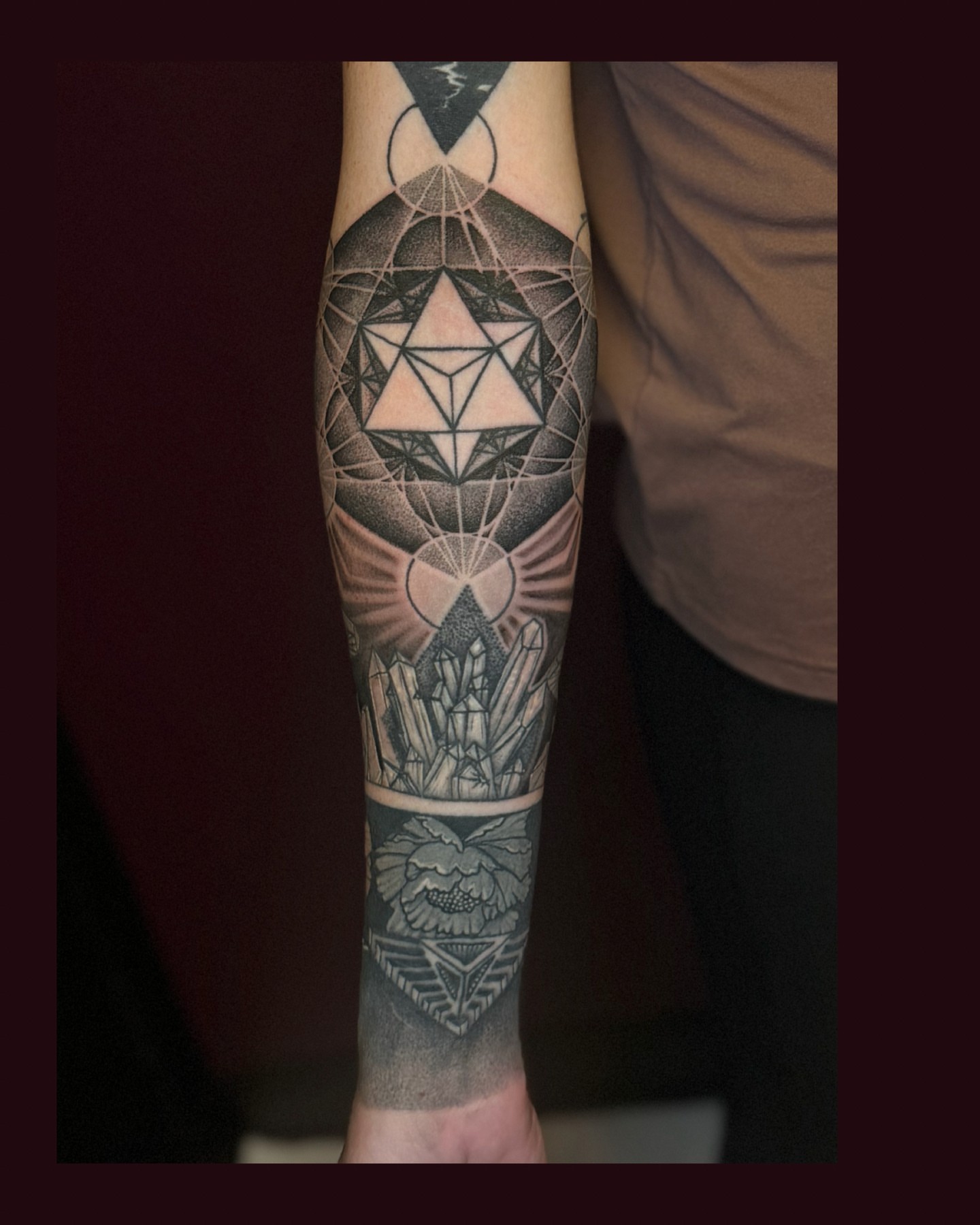 Geometric design dotwork tattoo on the forearm by Eugene Oregon tattoo artist