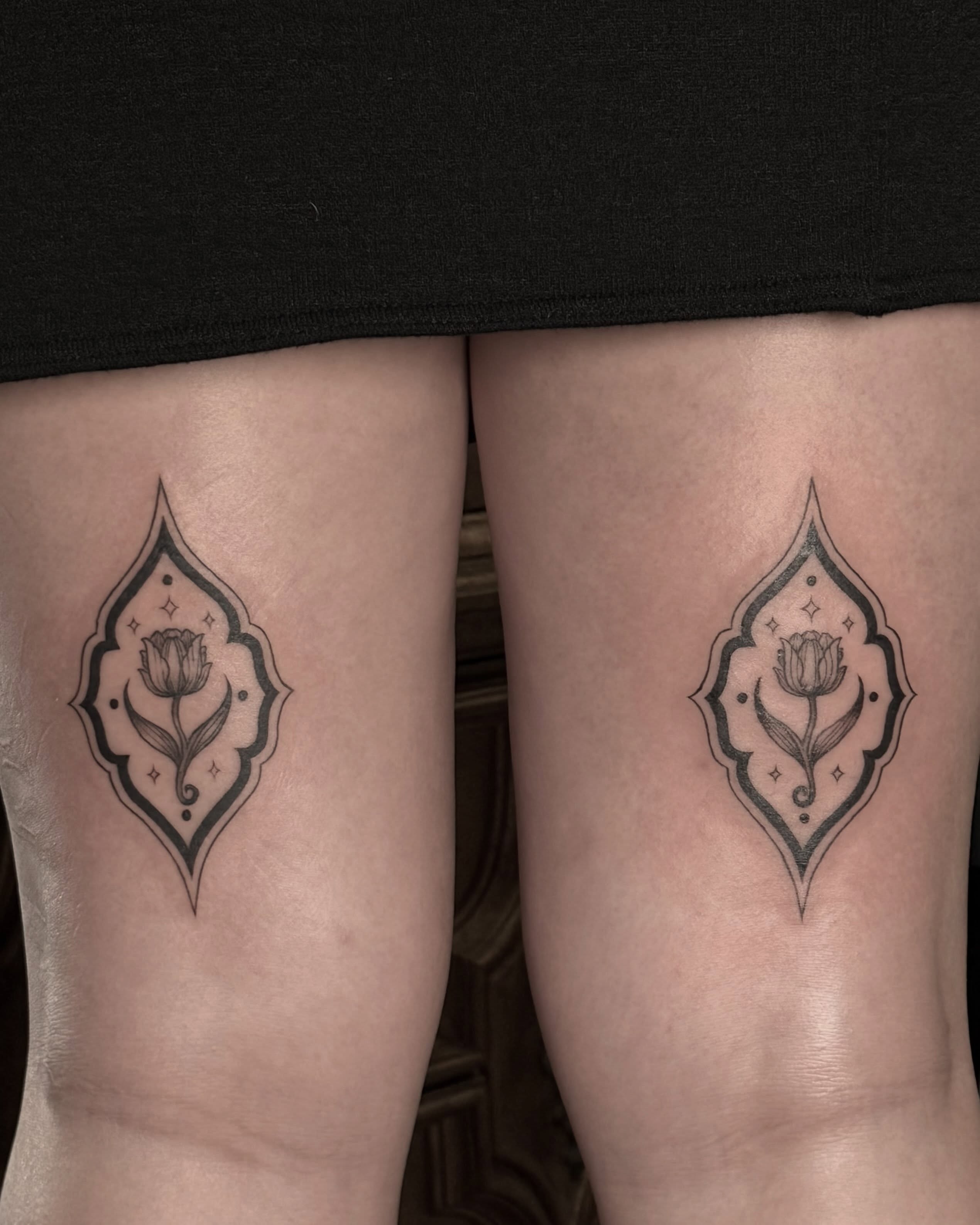 Rose black and grey tattoo on the thigh by Christian