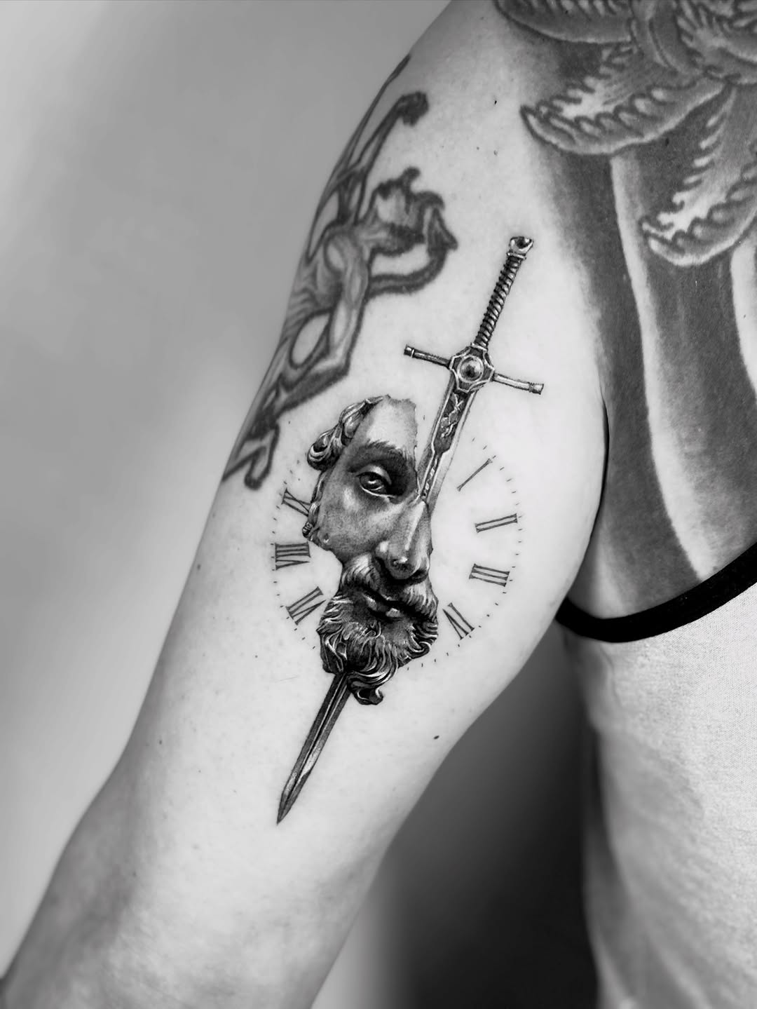 Tattoo by @ito_tattooist — realism, black_and_grey