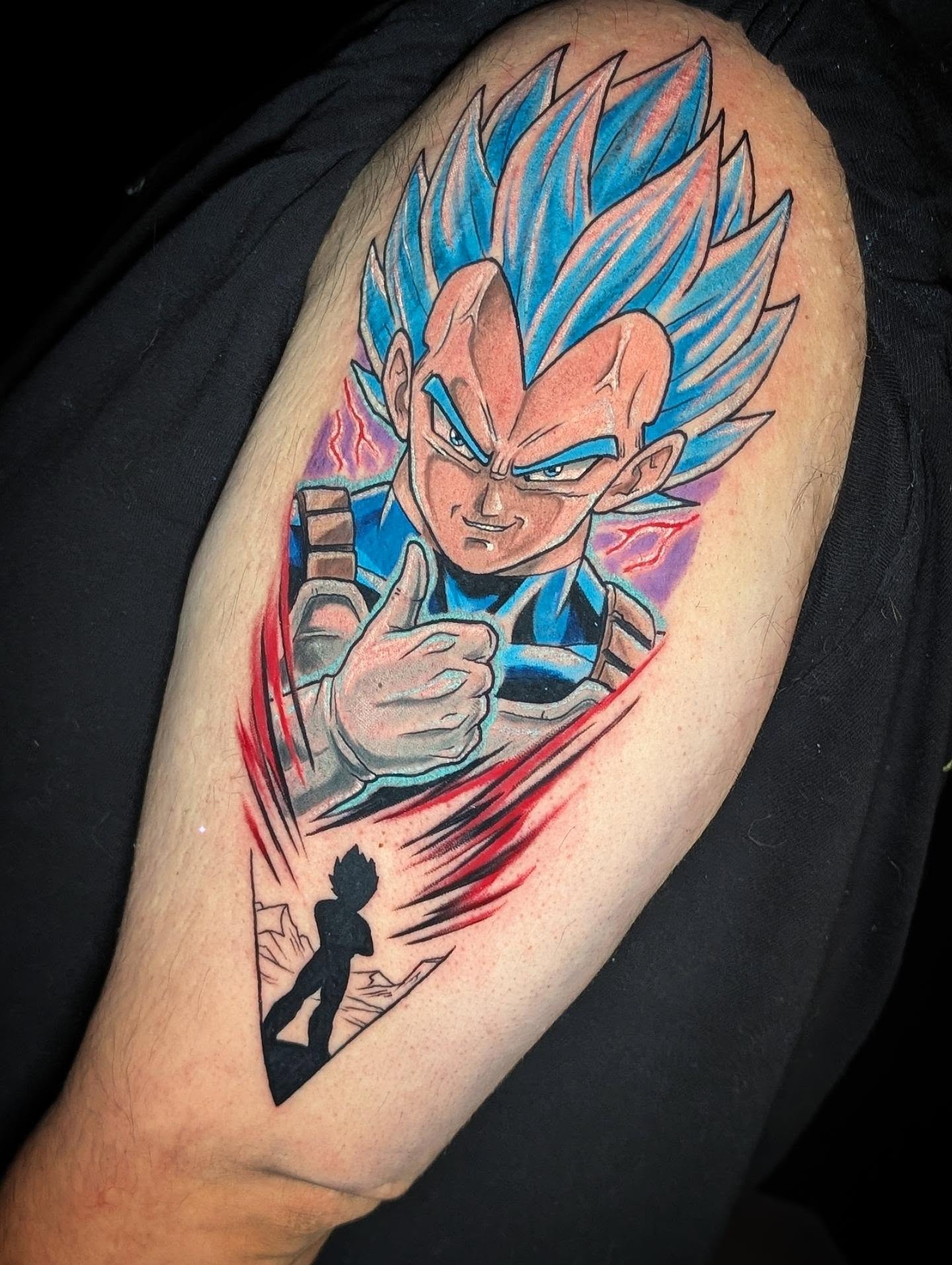 Vegeta anime tattoo on the upper arm by Will Alexander, Lombard, Illinois