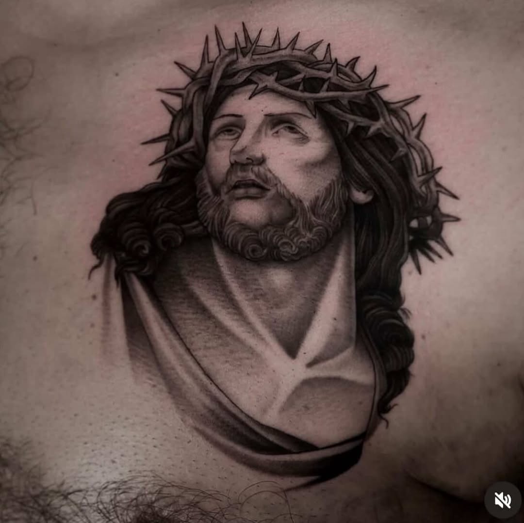 Jesus Christ with crown of thorns realism tattoo on the chest by Pat Moser