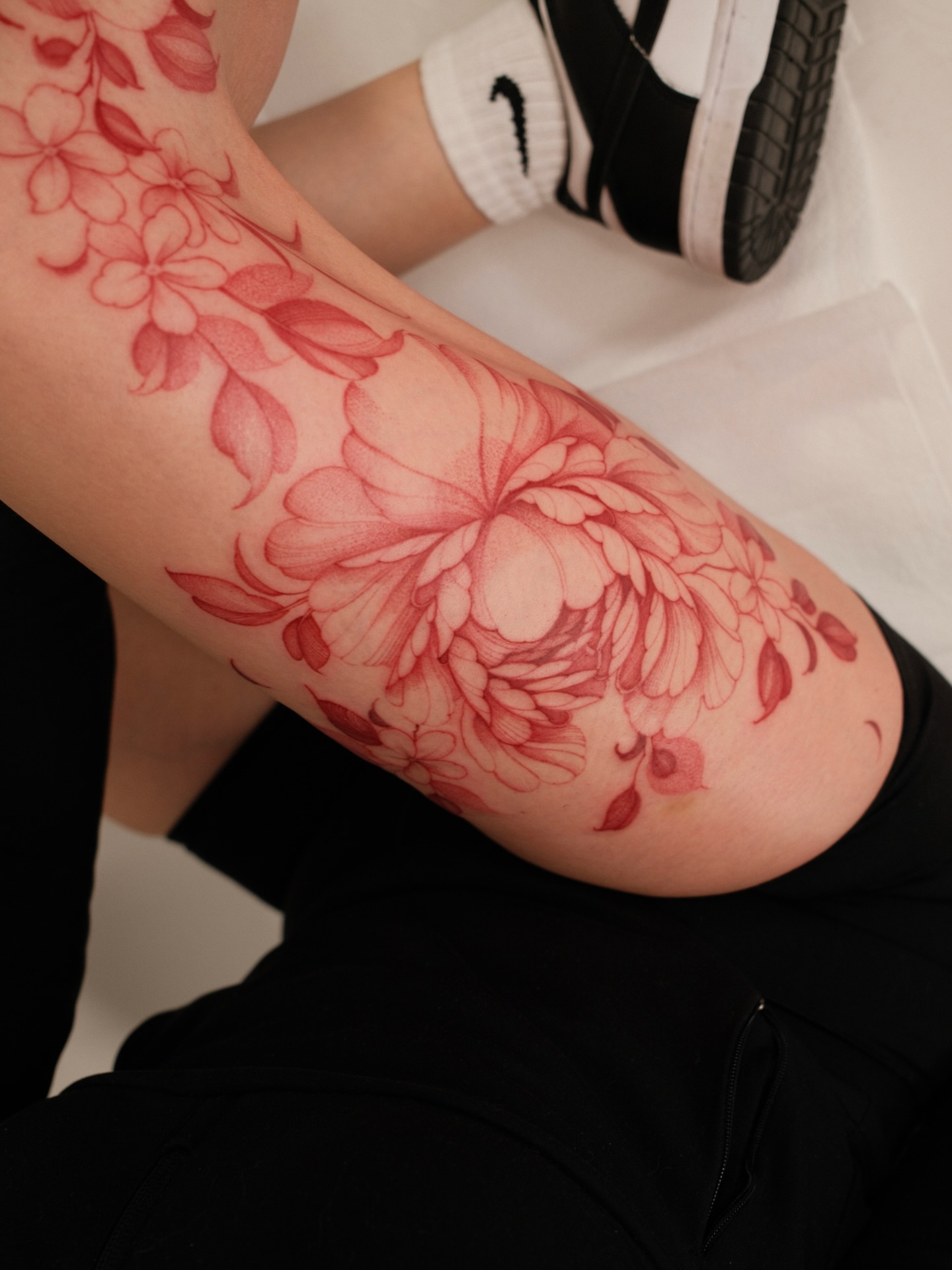 Floral arrangement dotwork tattoo on the thigh by LORIE π€ Floral Tattoo Artist, Los Angeles, California