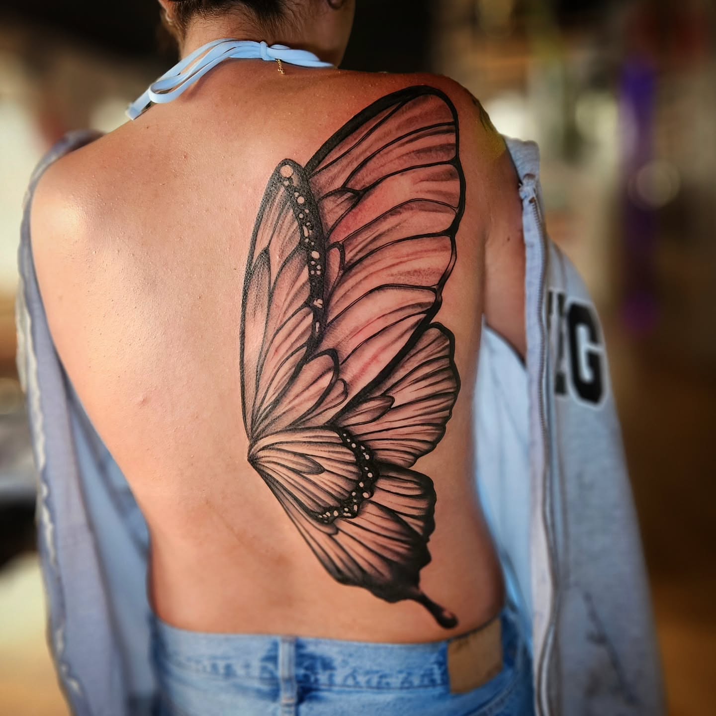 Butterfly wing dotwork tattoo on the back by Justin J-rust Smith