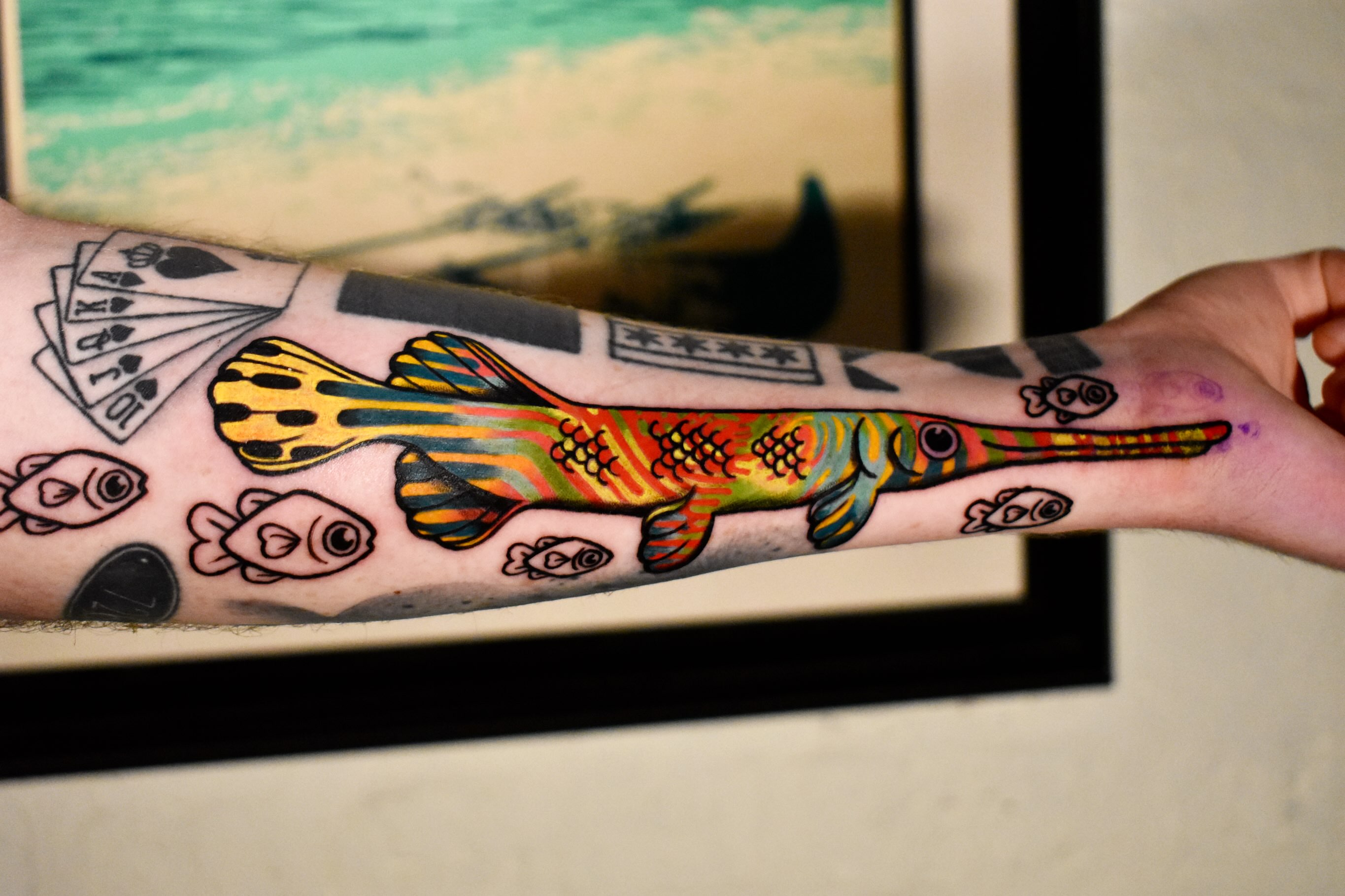 Fish American traditional tattoo on the forearm by Mackz