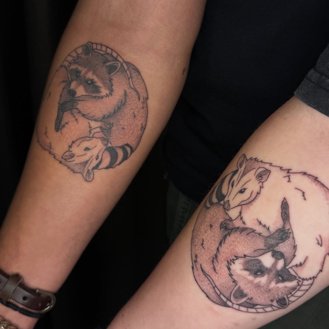 Raccoons black and grey tattoo on the forearm by ✧˖°. Jordan