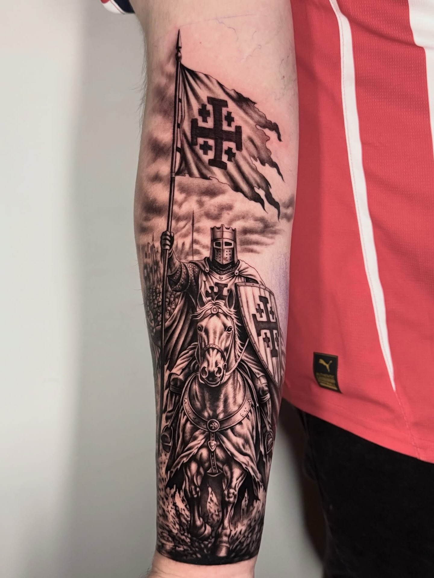 Knight on horseback realism tattoo on the forearm by Elijah Tattoos, San Diego, California