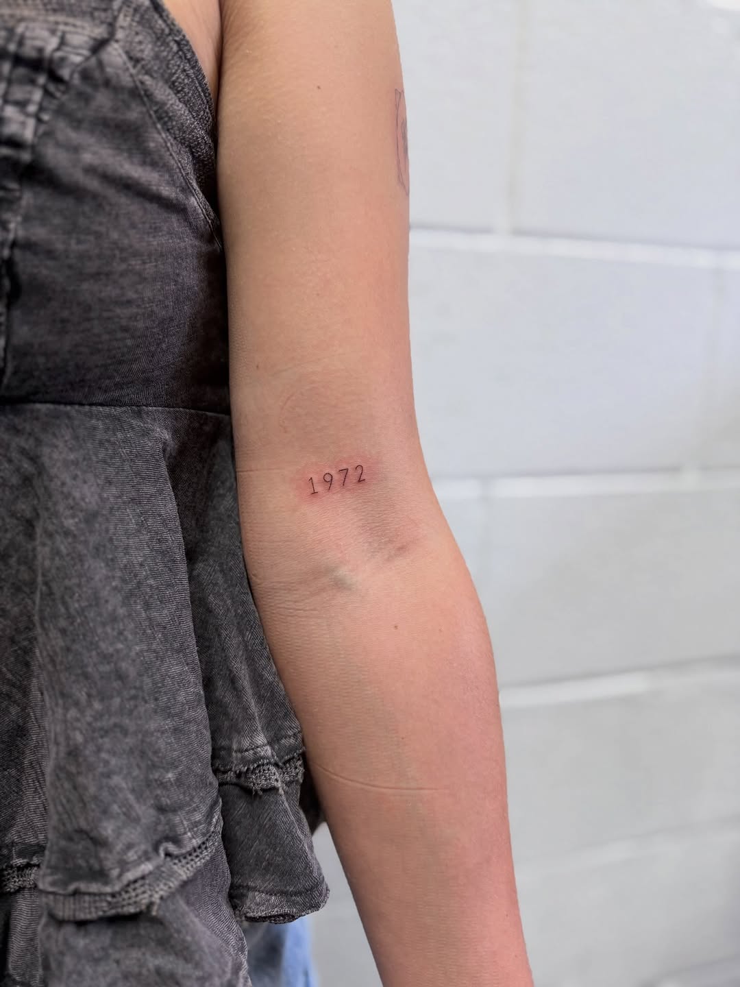 Tattoo by @reverie_finelines — fine_line, lettering_script