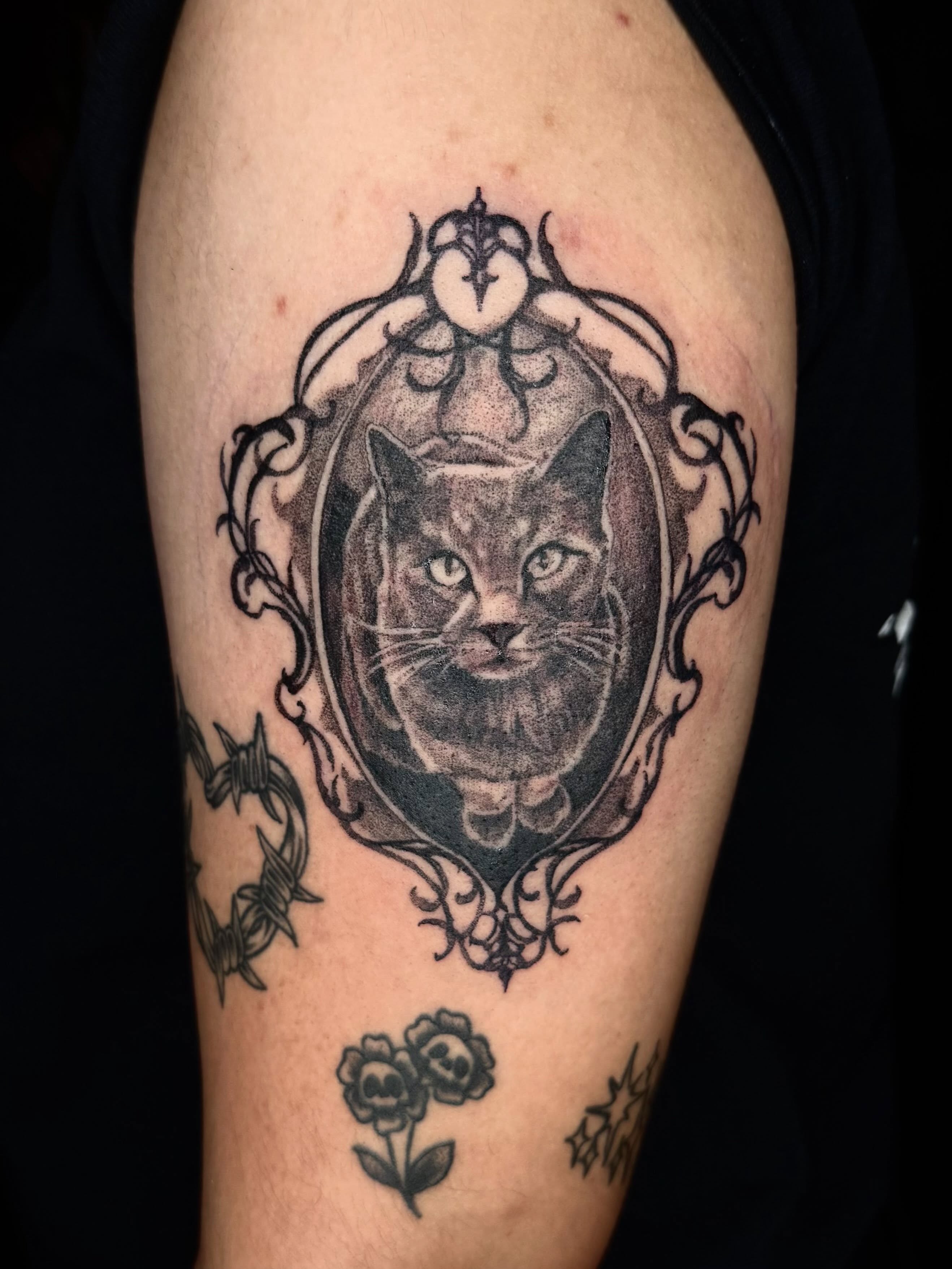 Cat portrait realism tattoo on the forearm by Isabella π€