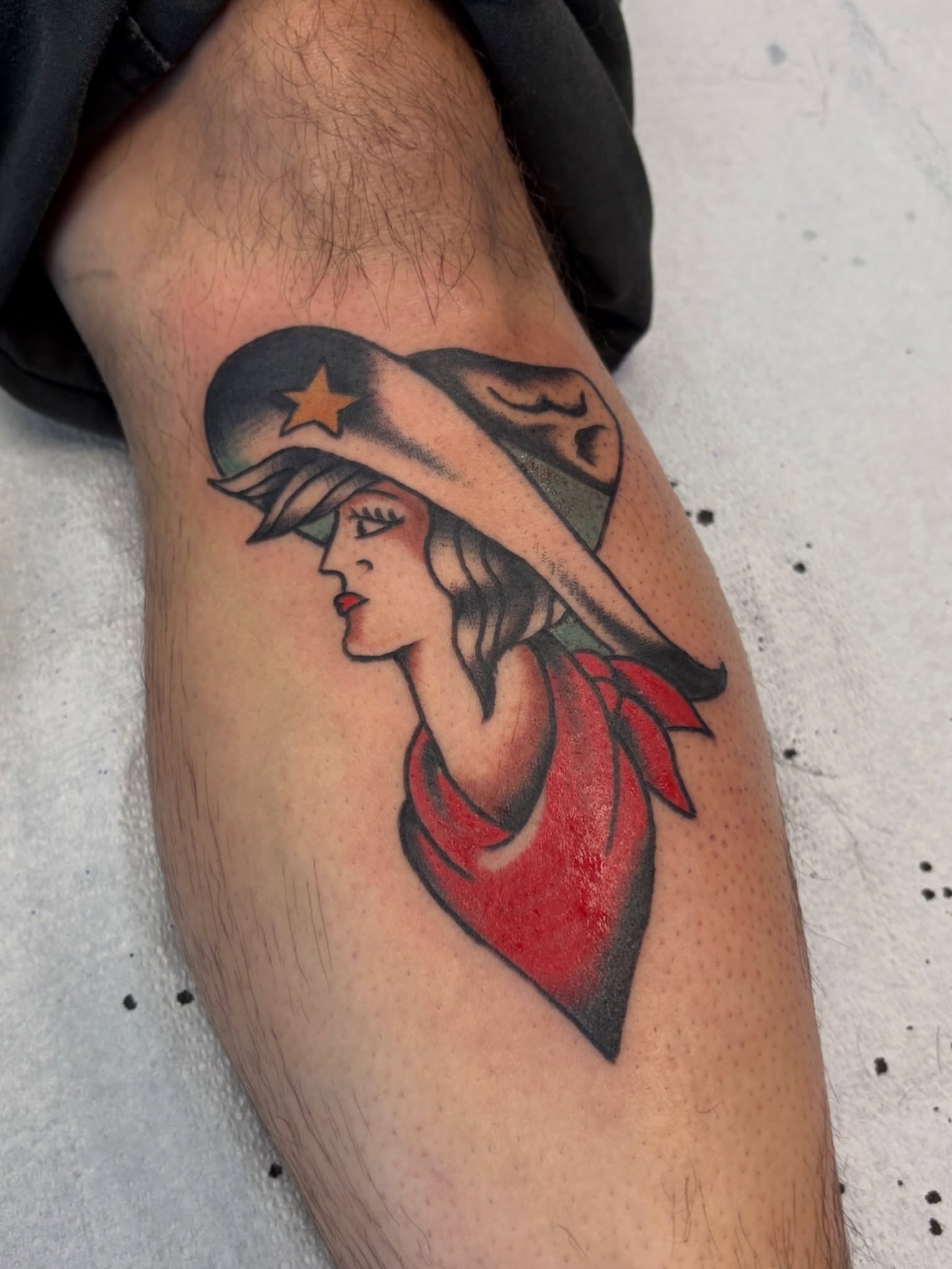 Woman wearing hat American traditional tattoo on the forearm by Sammy Tattoo, Austin, Texas