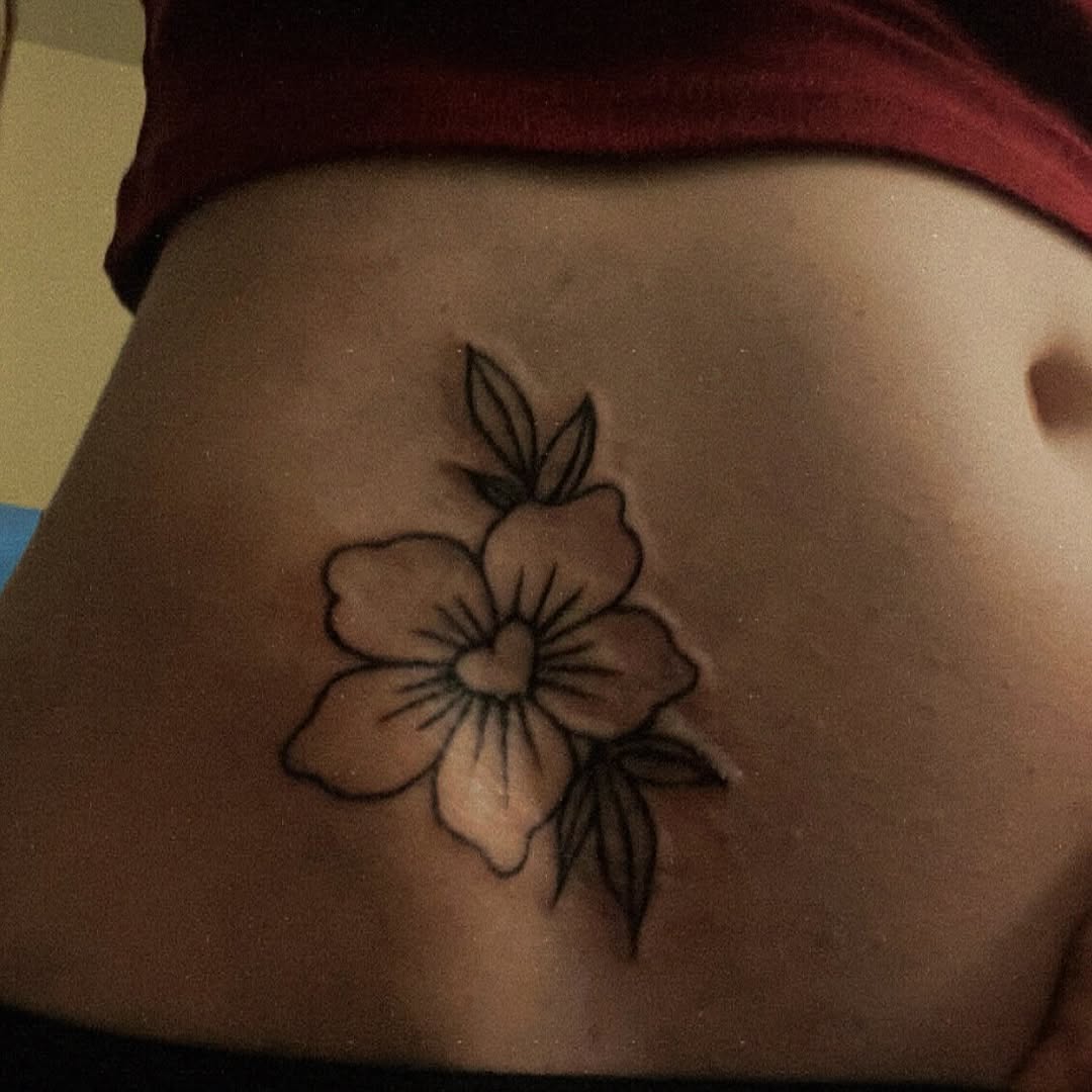 Flower sketch tattoo on the torso by RVA Tattoo Artist
