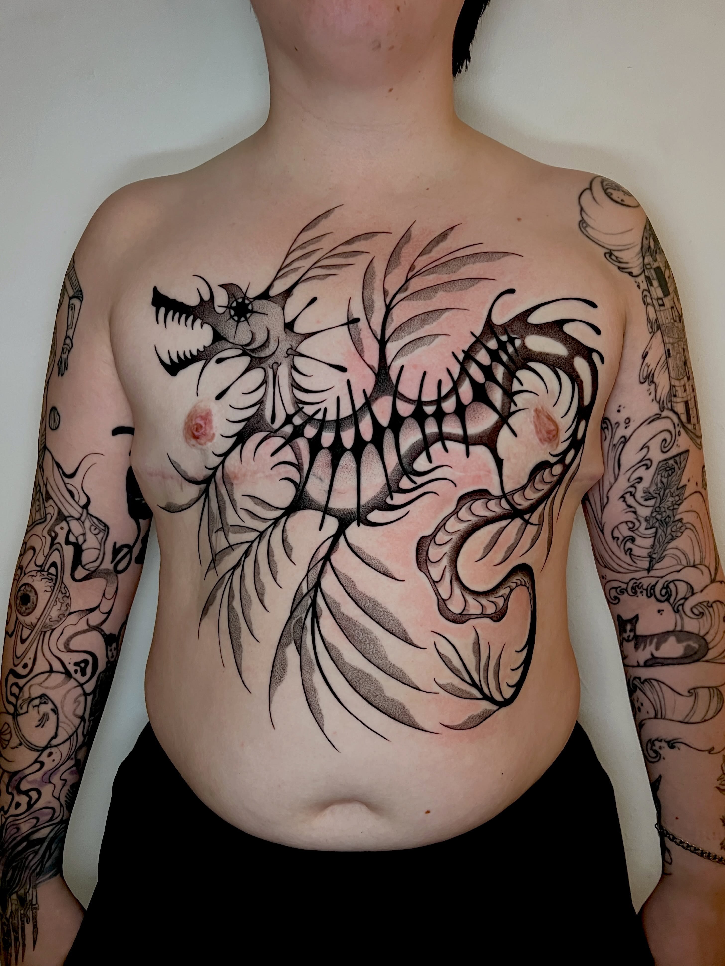 Dragon black and grey tattoo on the chest by AJ π°π· LA tattoo